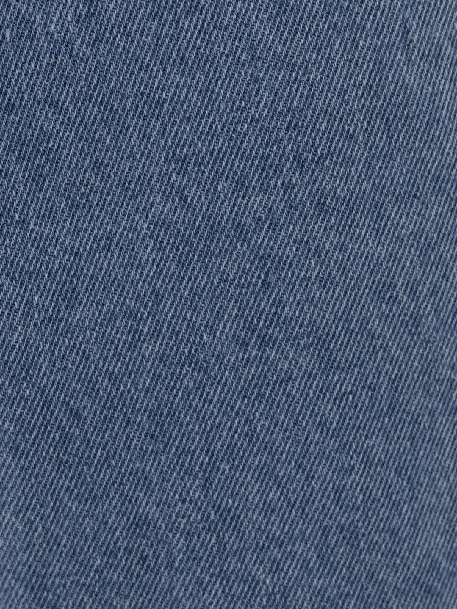 Flared jeans with triangle inset at waistband