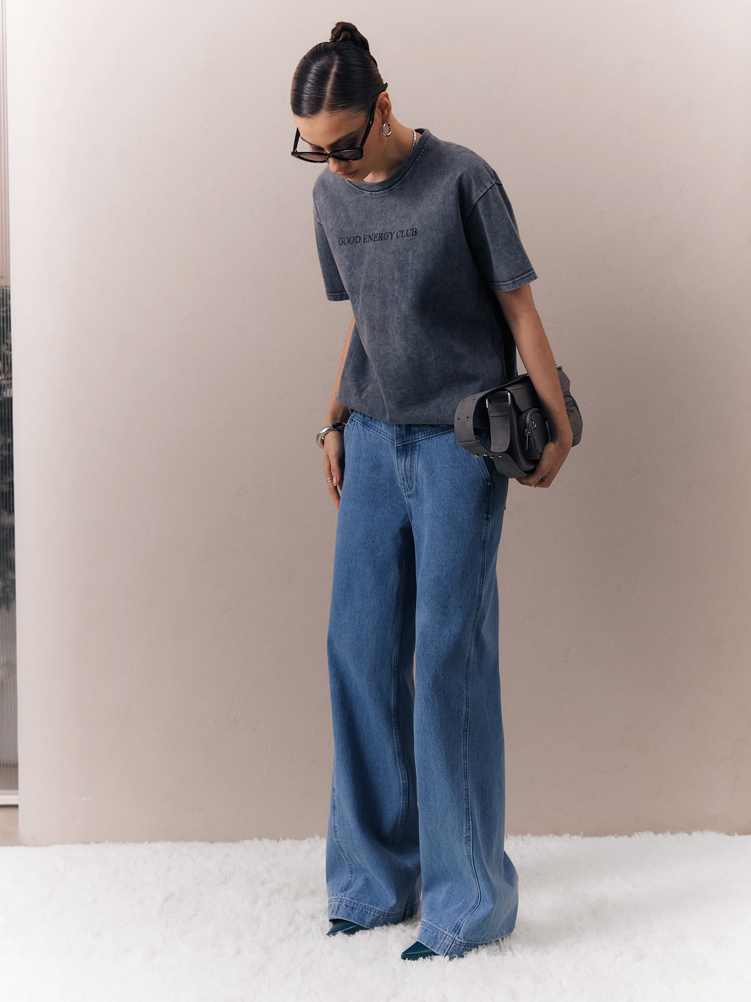 Flared jeans with triangle inset at waistband