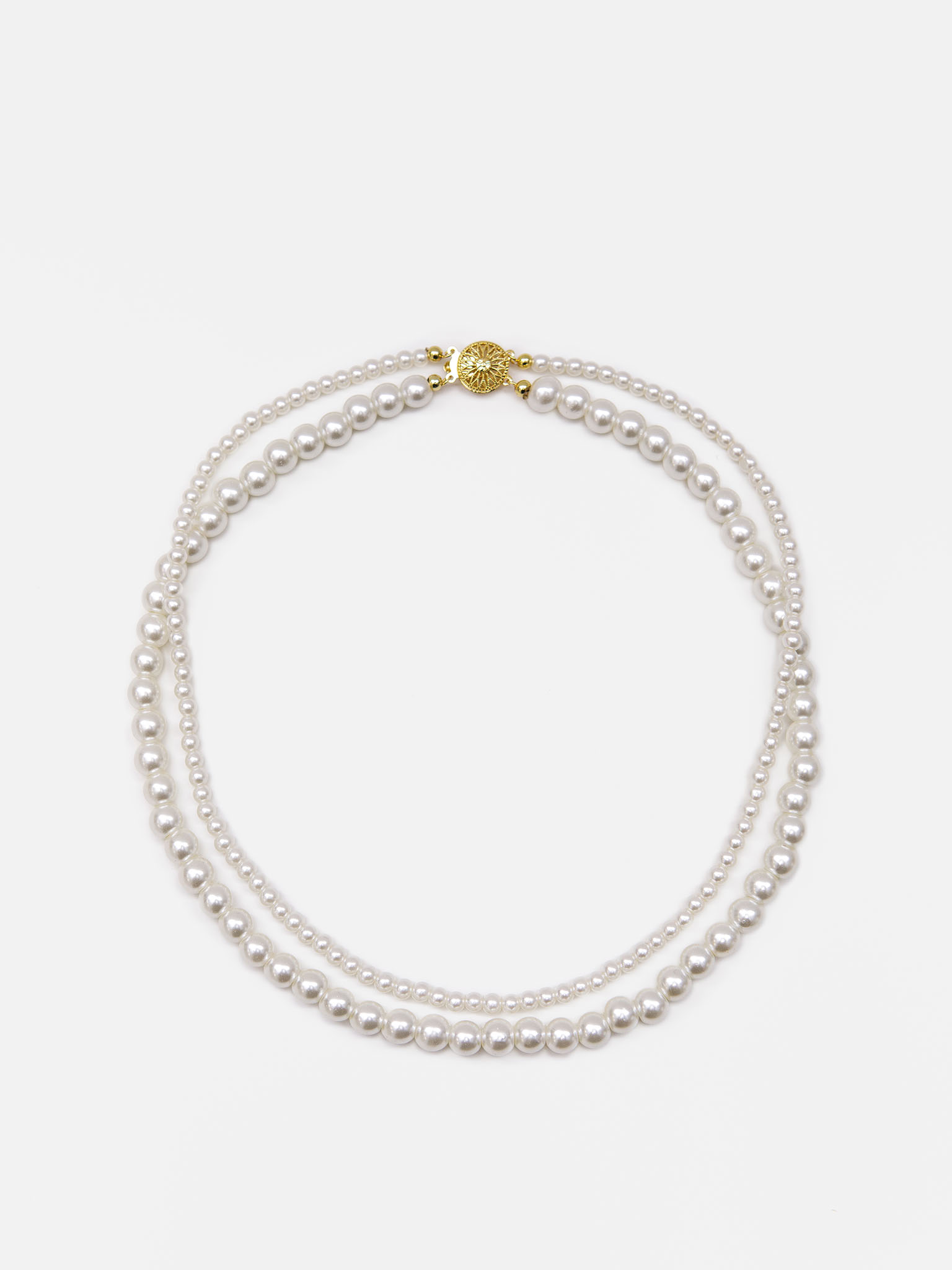 Double pearl necklace with accent lock
