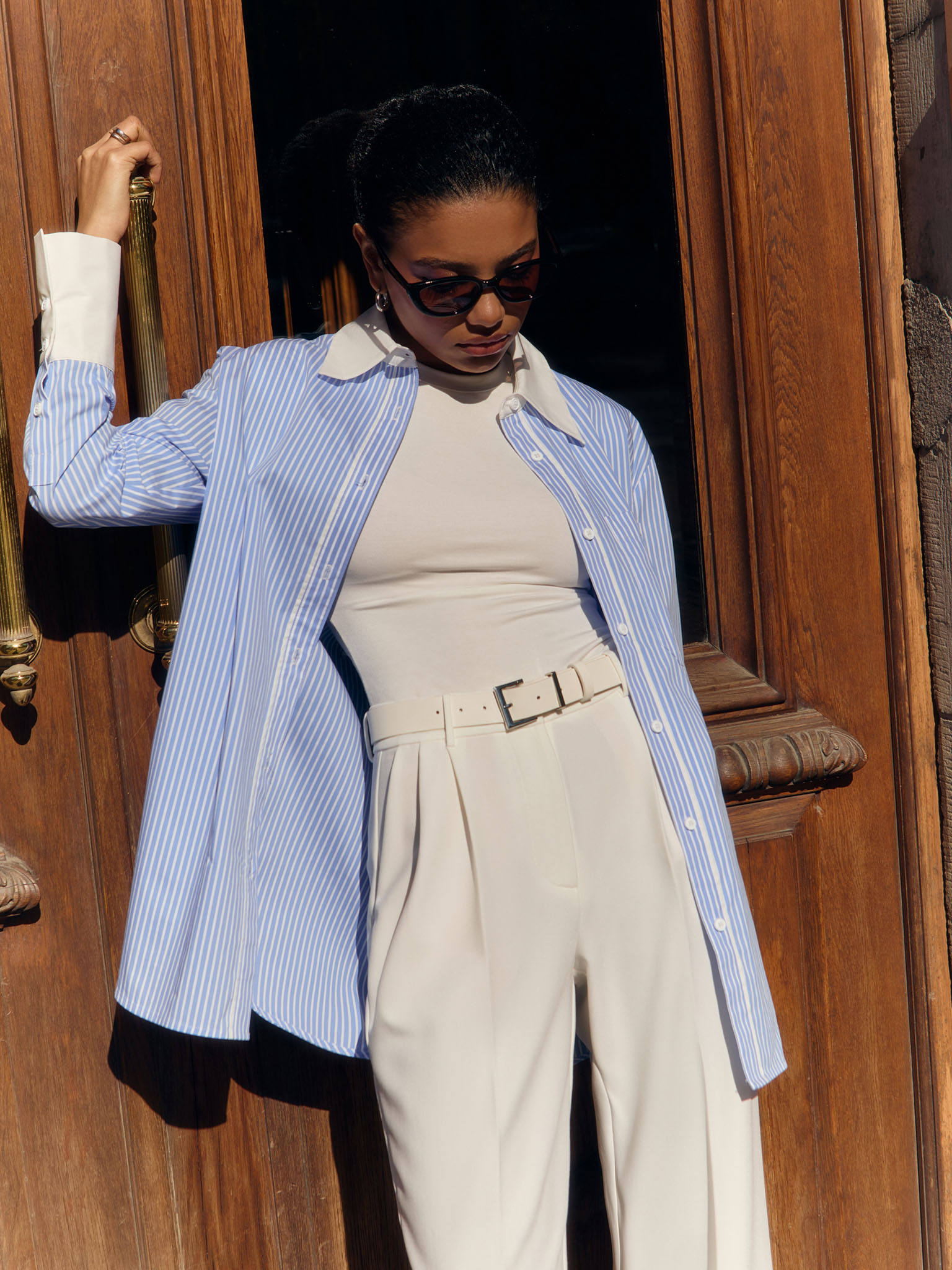 Trousers with a wide eco-leather belt