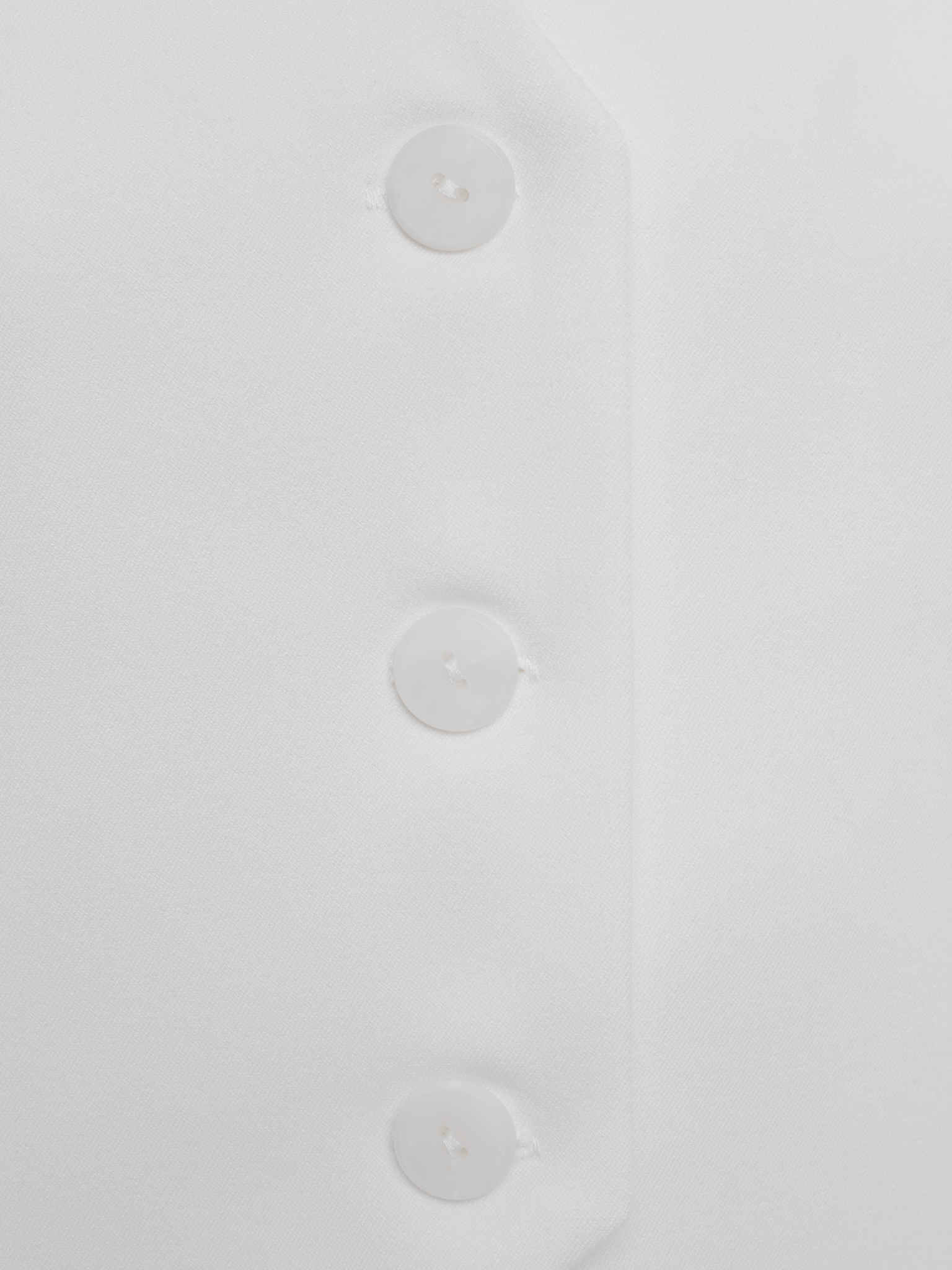 Fitted waistcoat with open shoulders