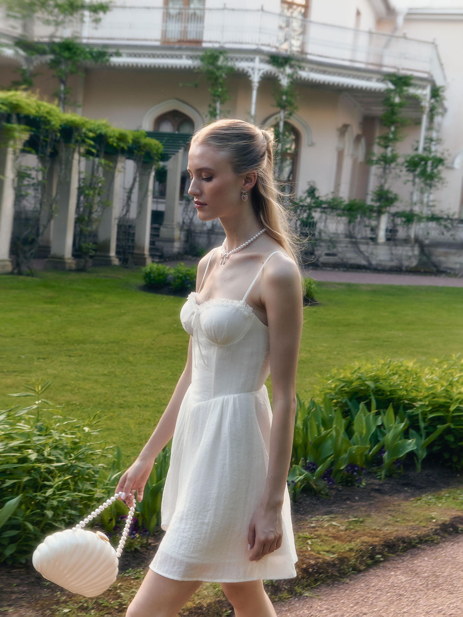 Mini strappy dress with lace ruffles on the bodice