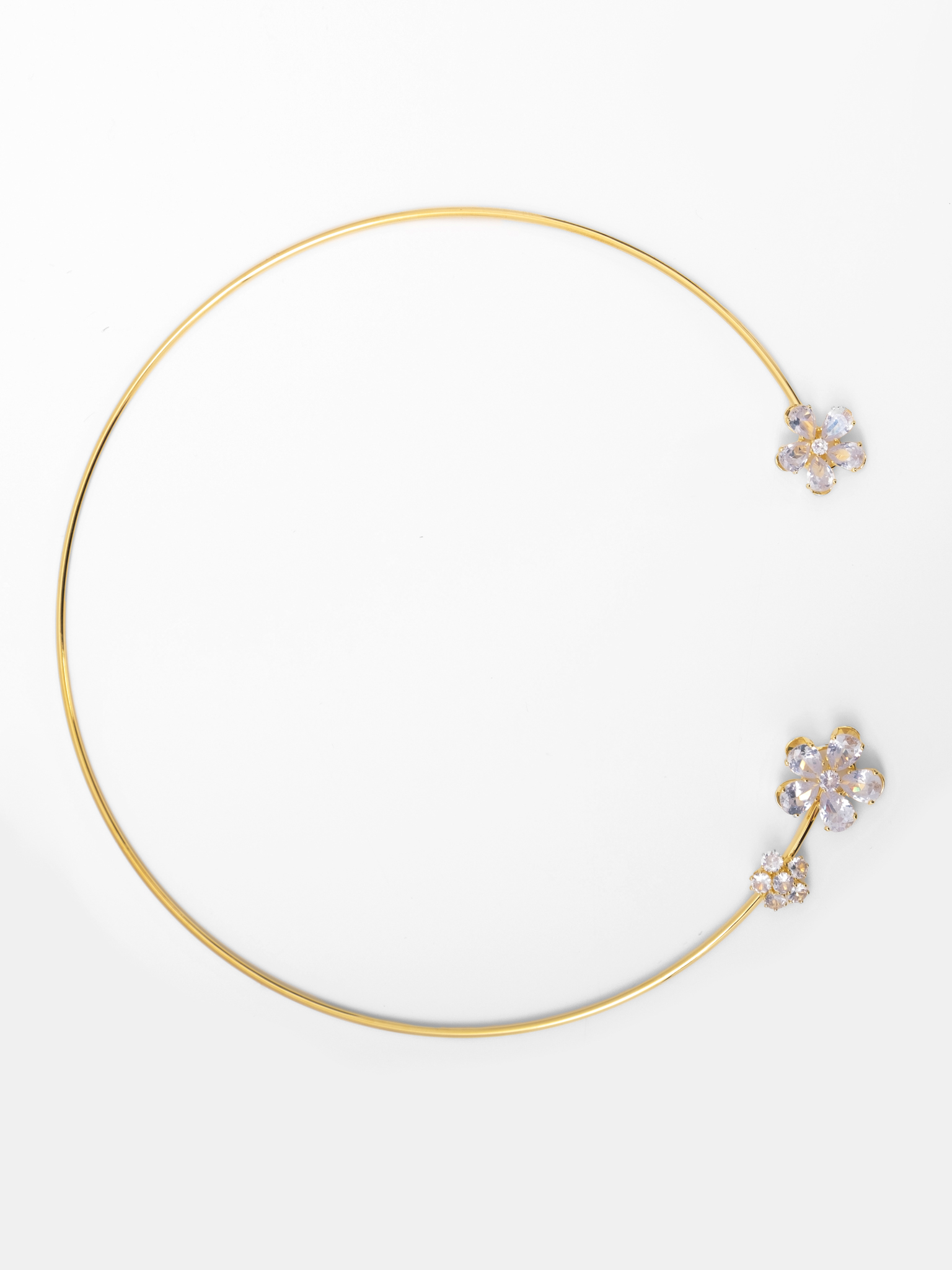Slim golden necklace with stone flowers