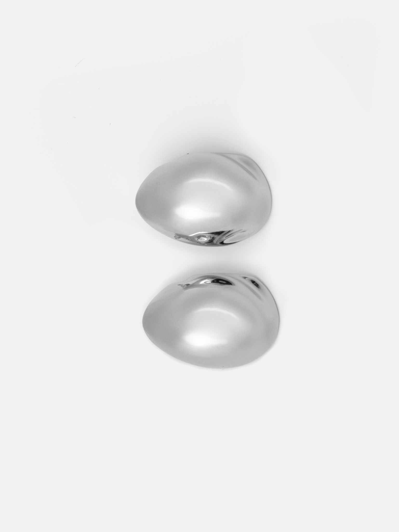 Lustrous metal brass earrings