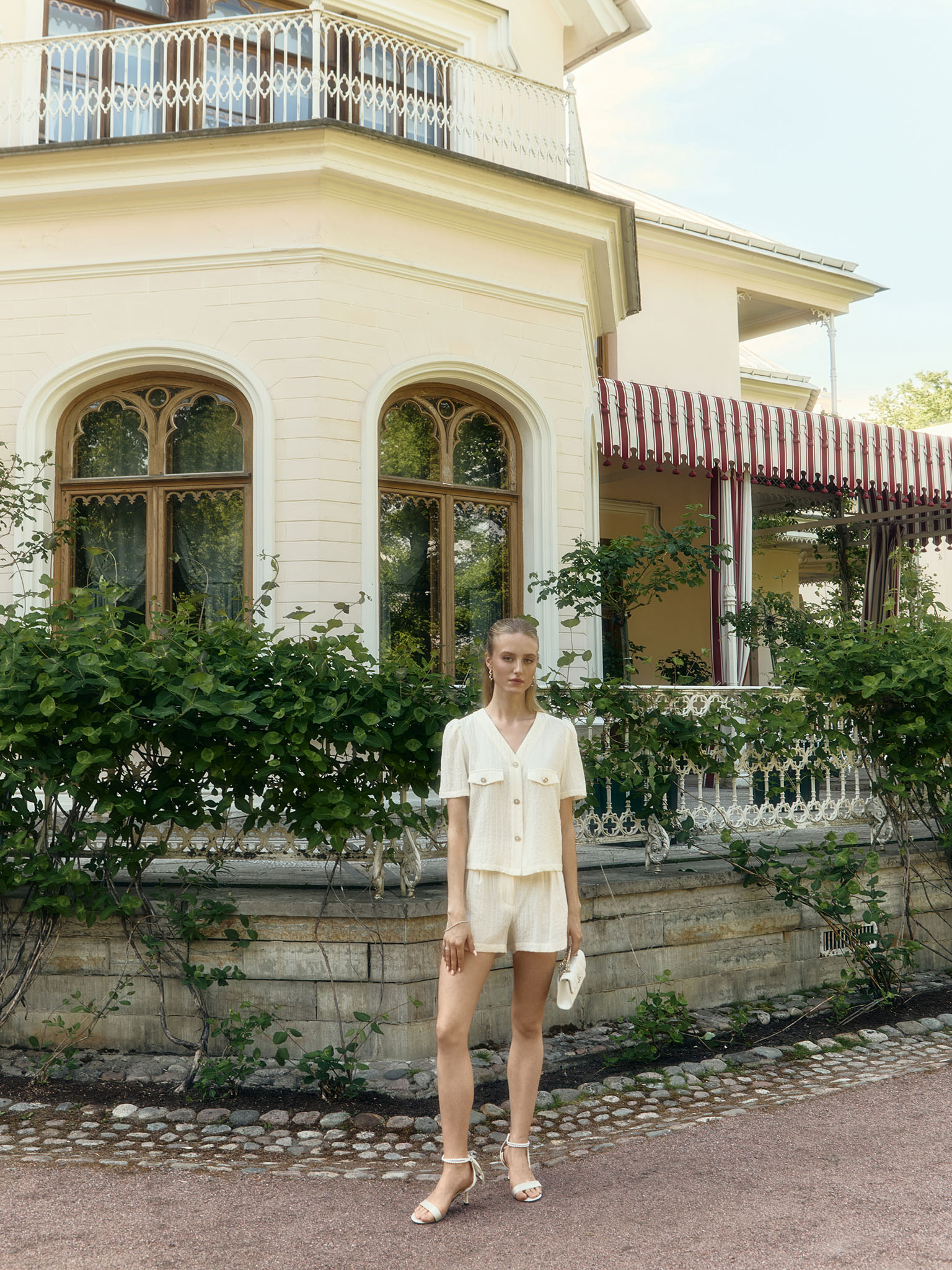 Short-sleeved blouse in textured fabric