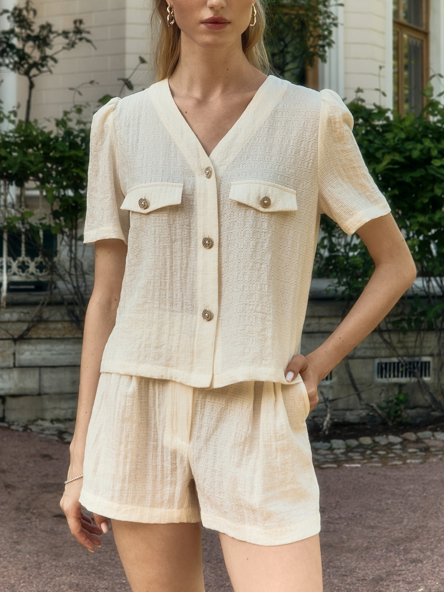 Short-sleeved blouse in textured fabric