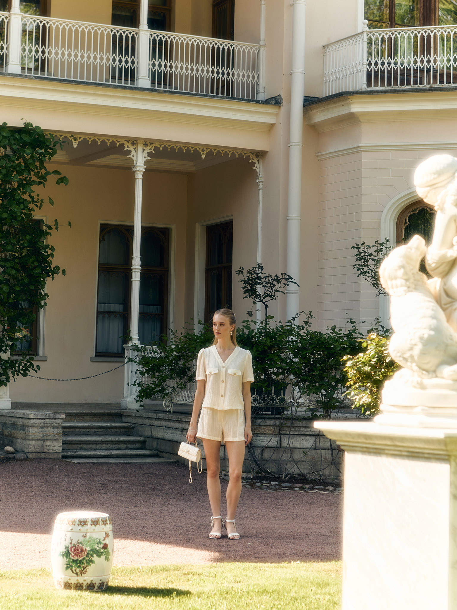 Mini shorts in textured fabric with waist pleats