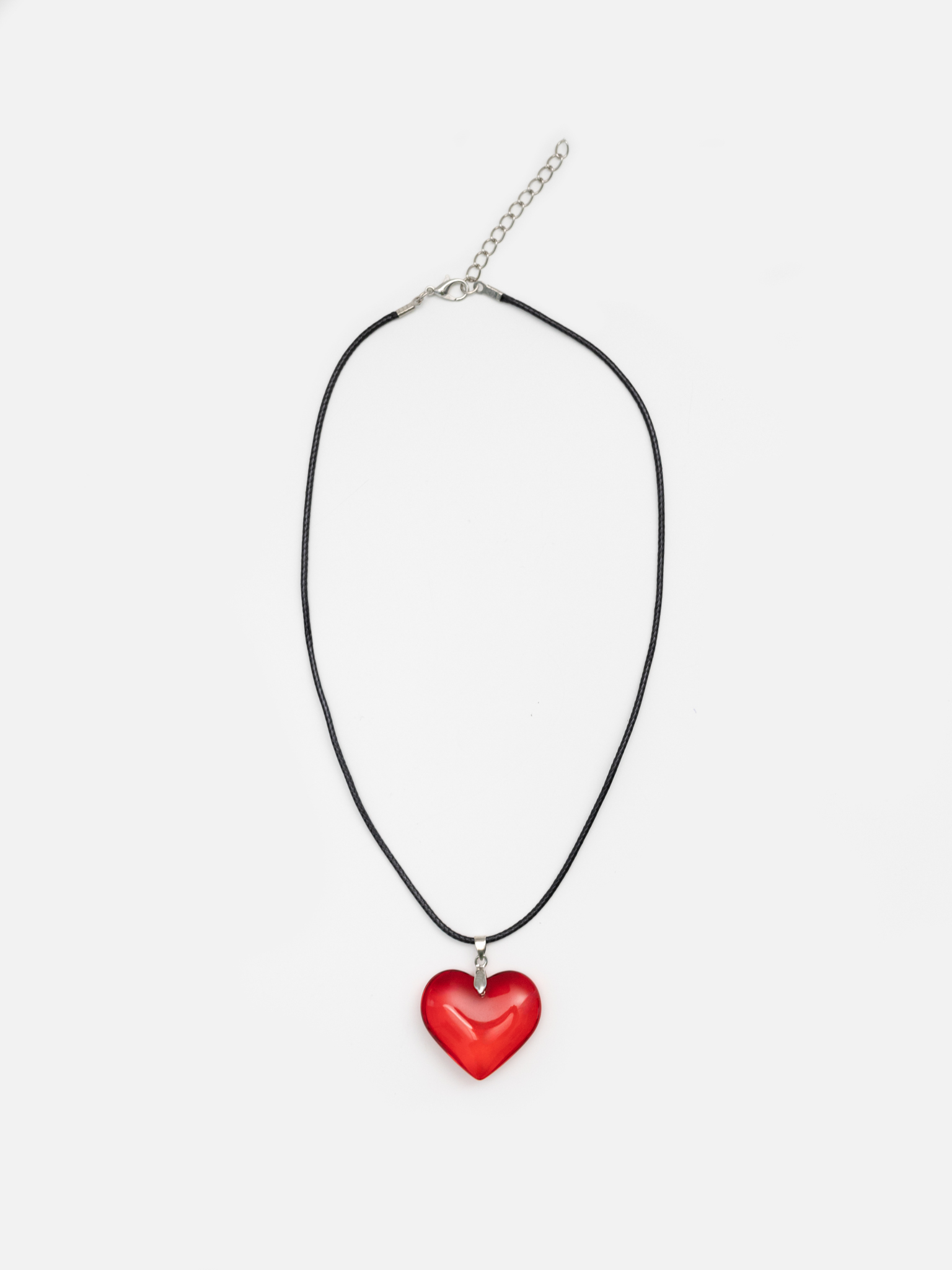 Monochrome thread with glass pendant