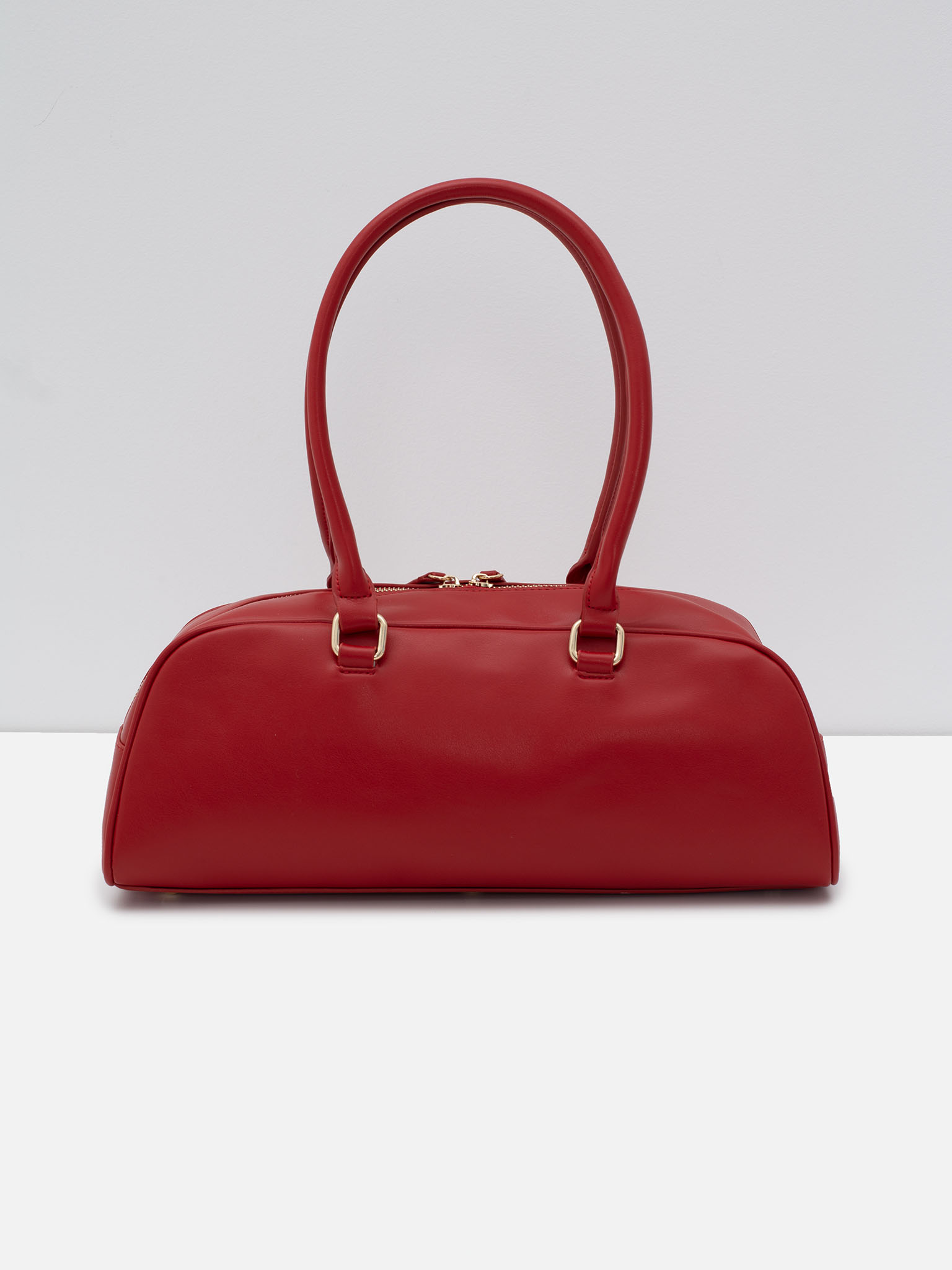 Long baguette bag with thin handles