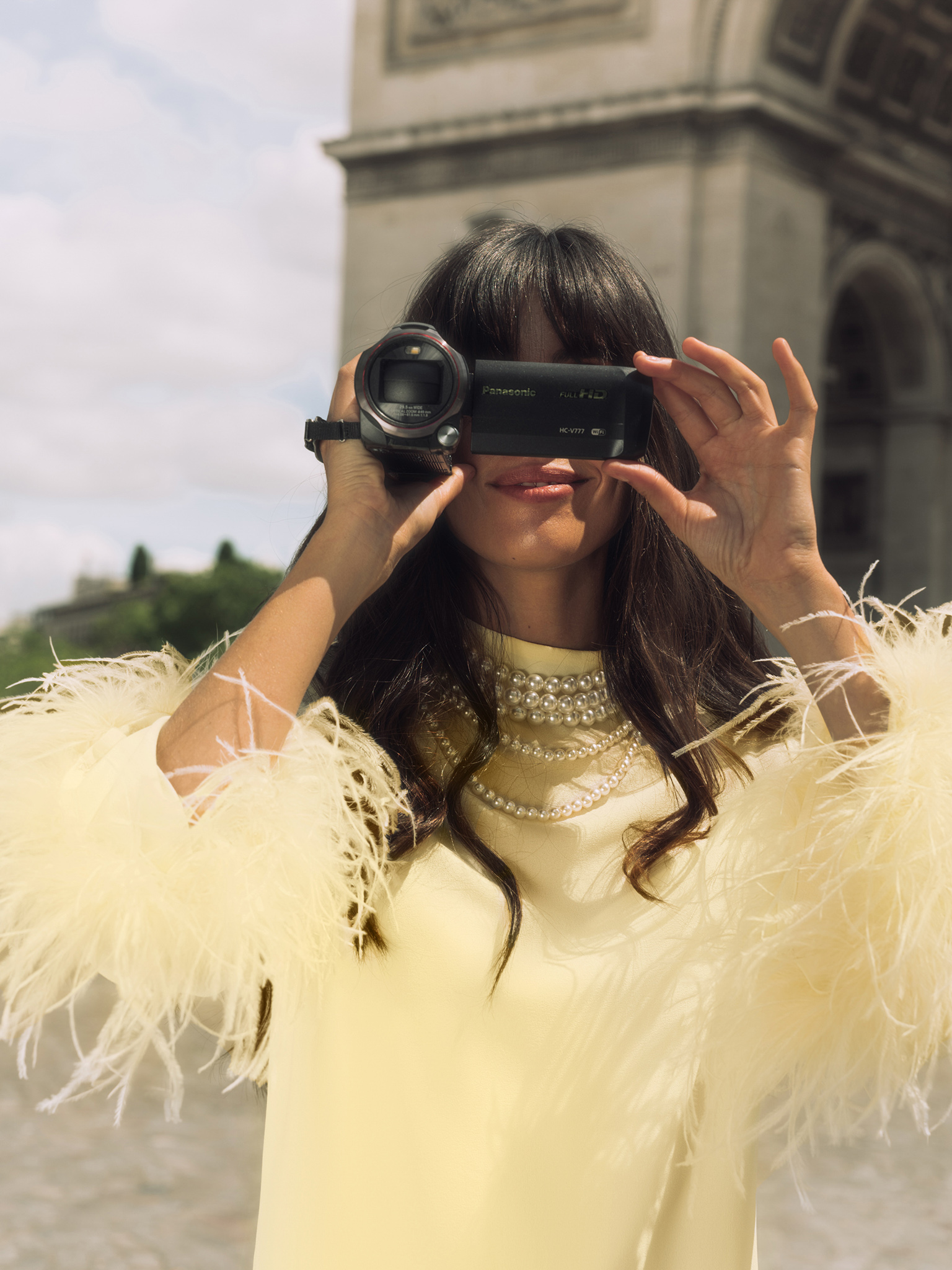 Straight midi dress with feathers on the cuffs