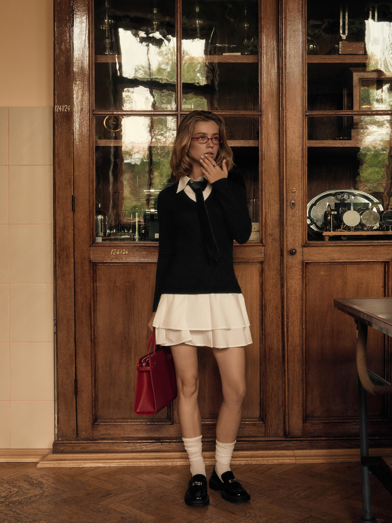 Double material mini dress with pleated skirt