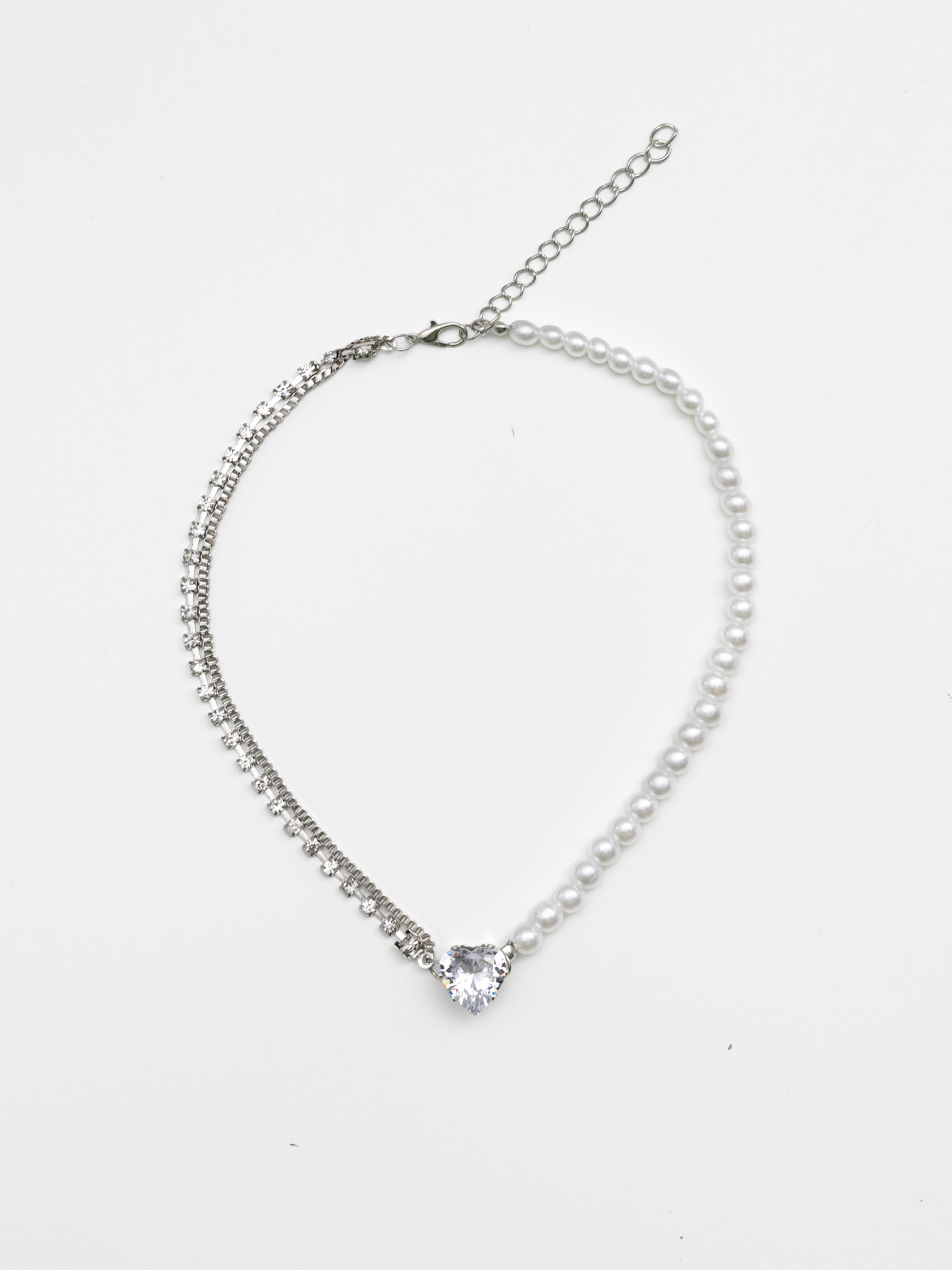 Asymmetrical necklace with heart pendant