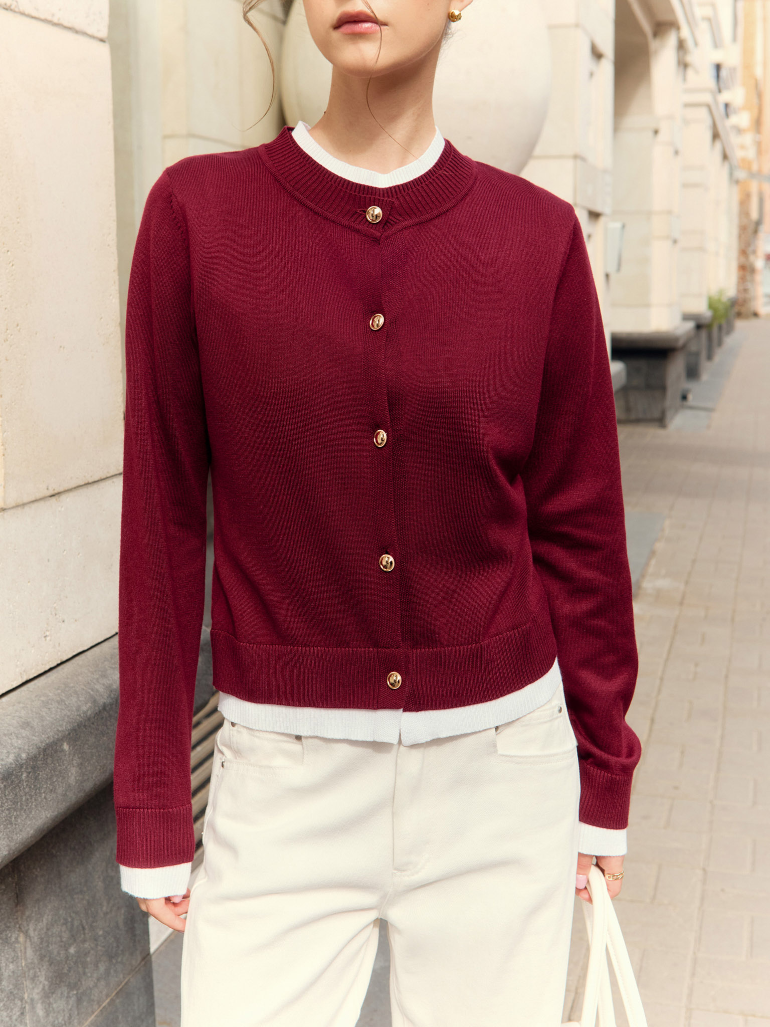 Knitted cardigan with contrasting cuffs and bottom edge