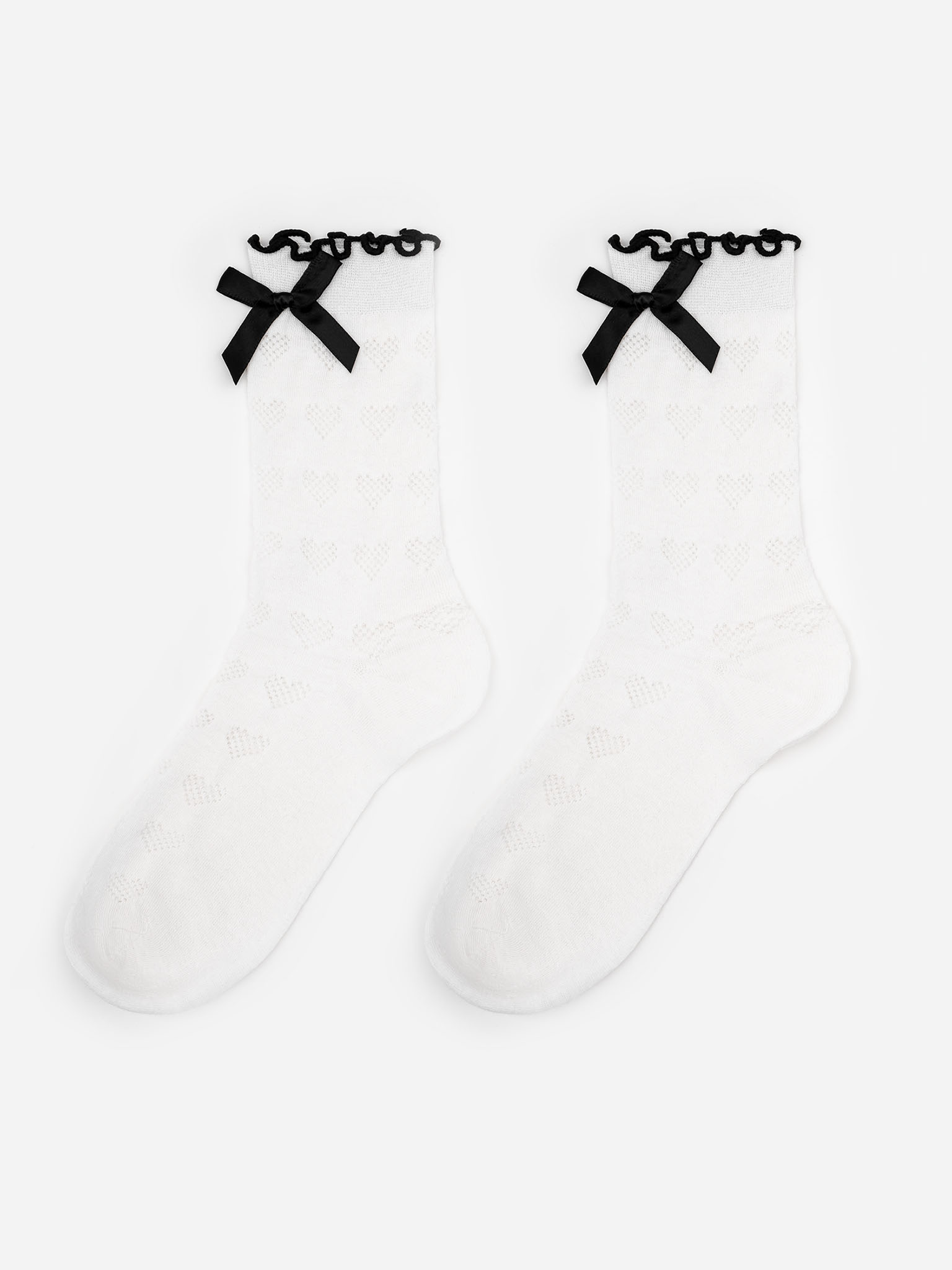 Set of two pairs of socks with ornaments and contrasting bows