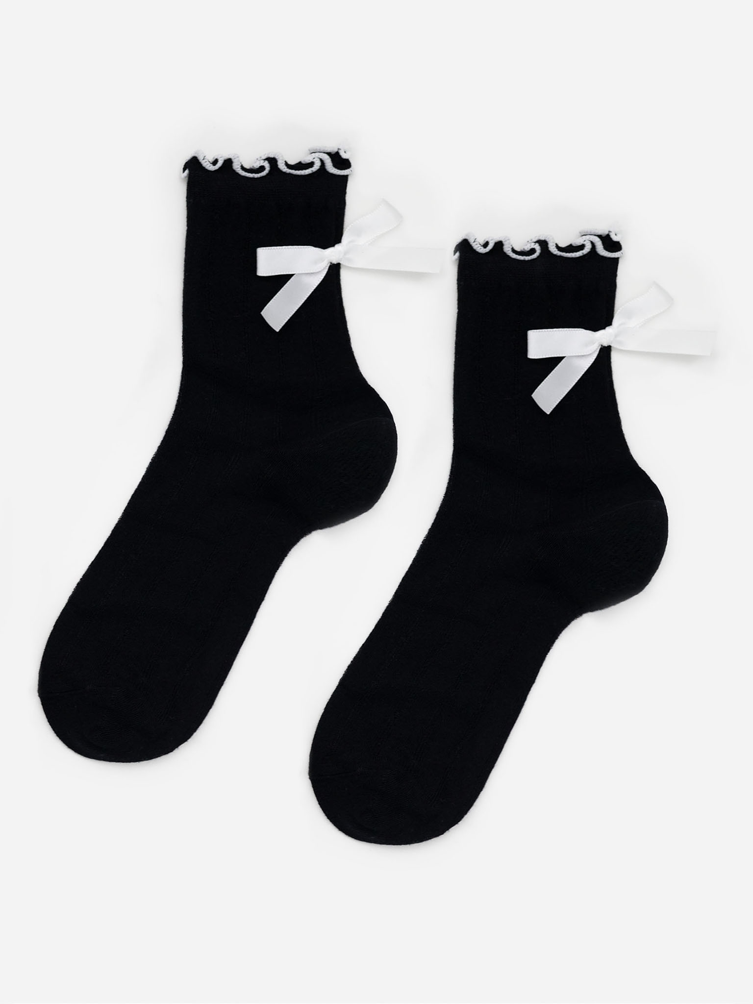 Sock set with contrast edging and bows at the back