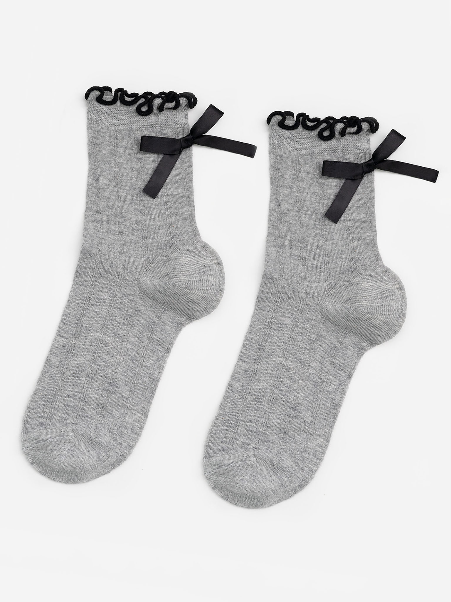 Sock set with contrast edging and bows at the back