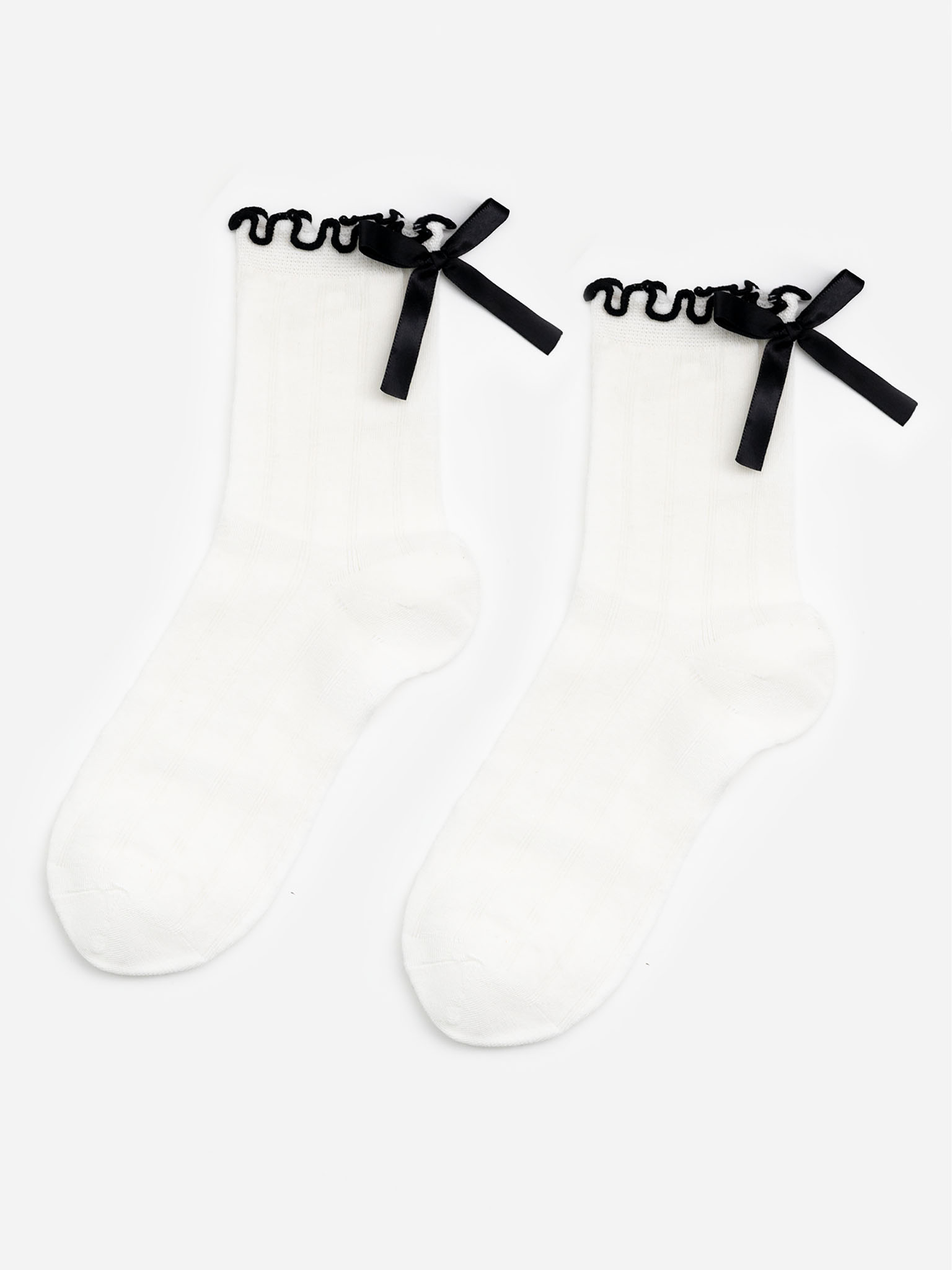 Sock set with contrast edging and bows at the back
