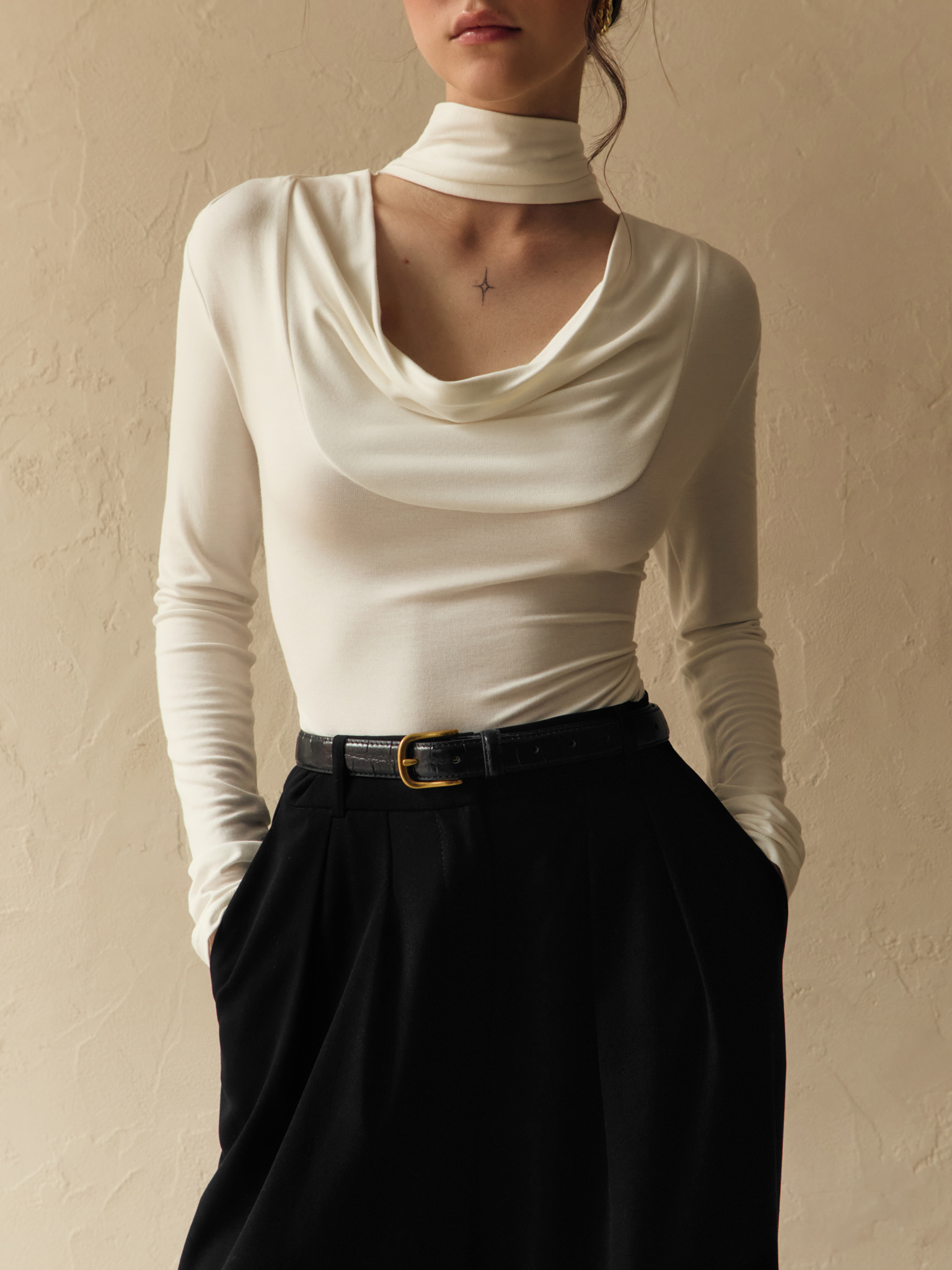 Textured leather belt with metal buckle