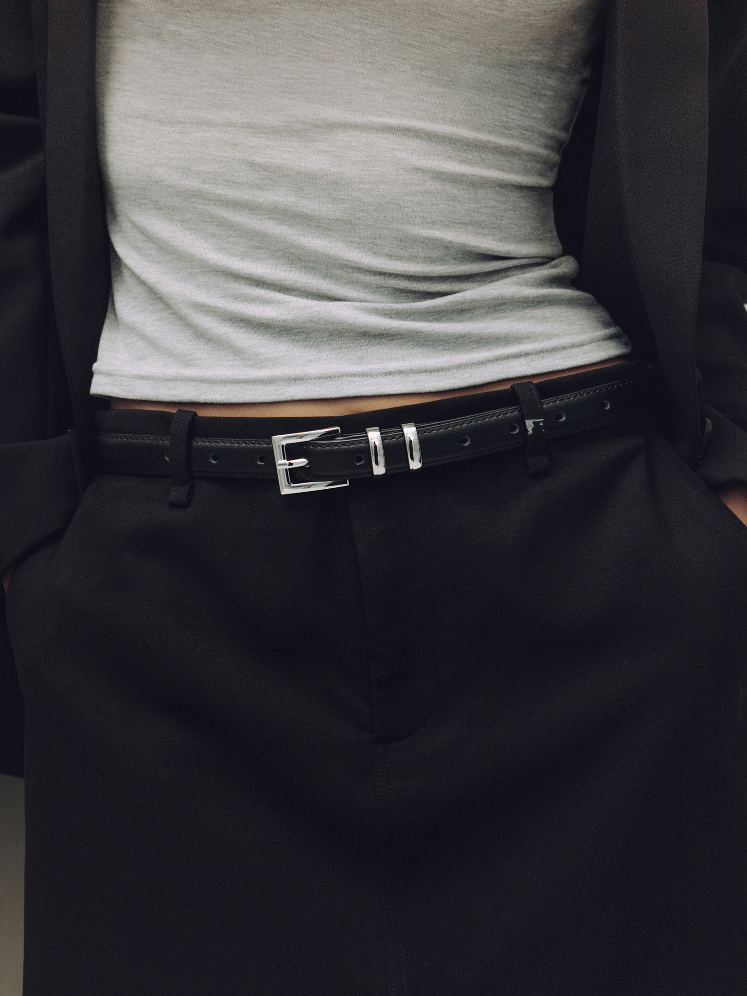 Slim leather belt with metal loops