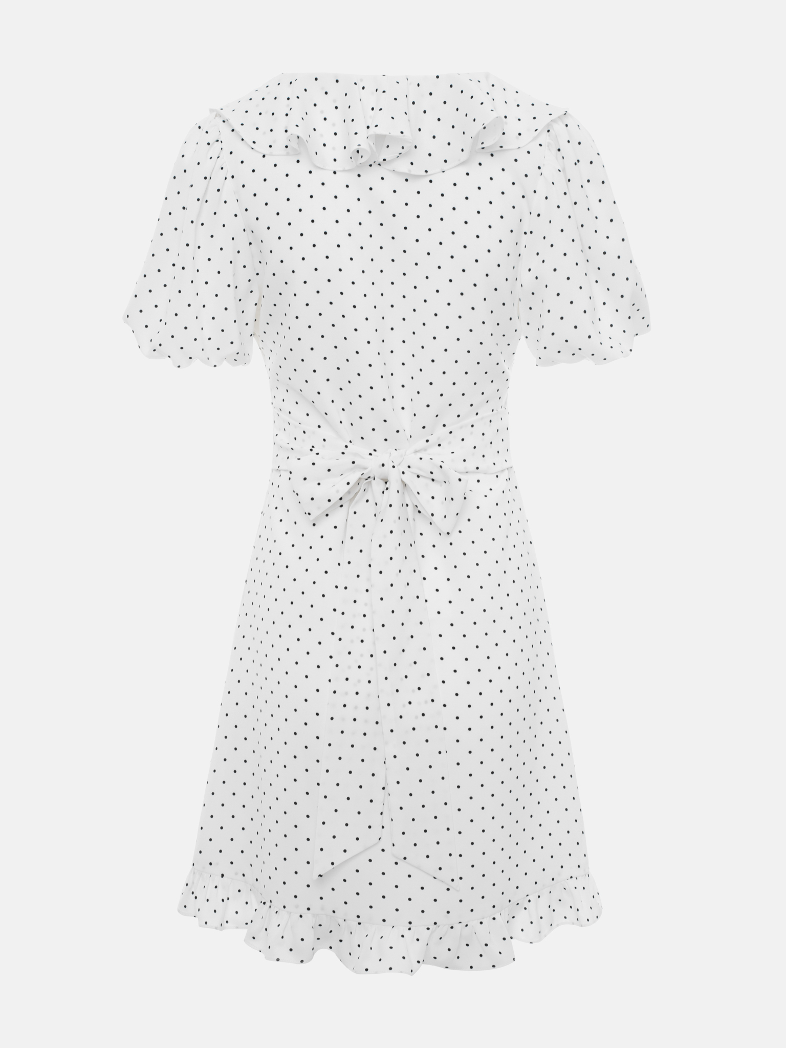 Mini polka-dot dress with contrasting flower