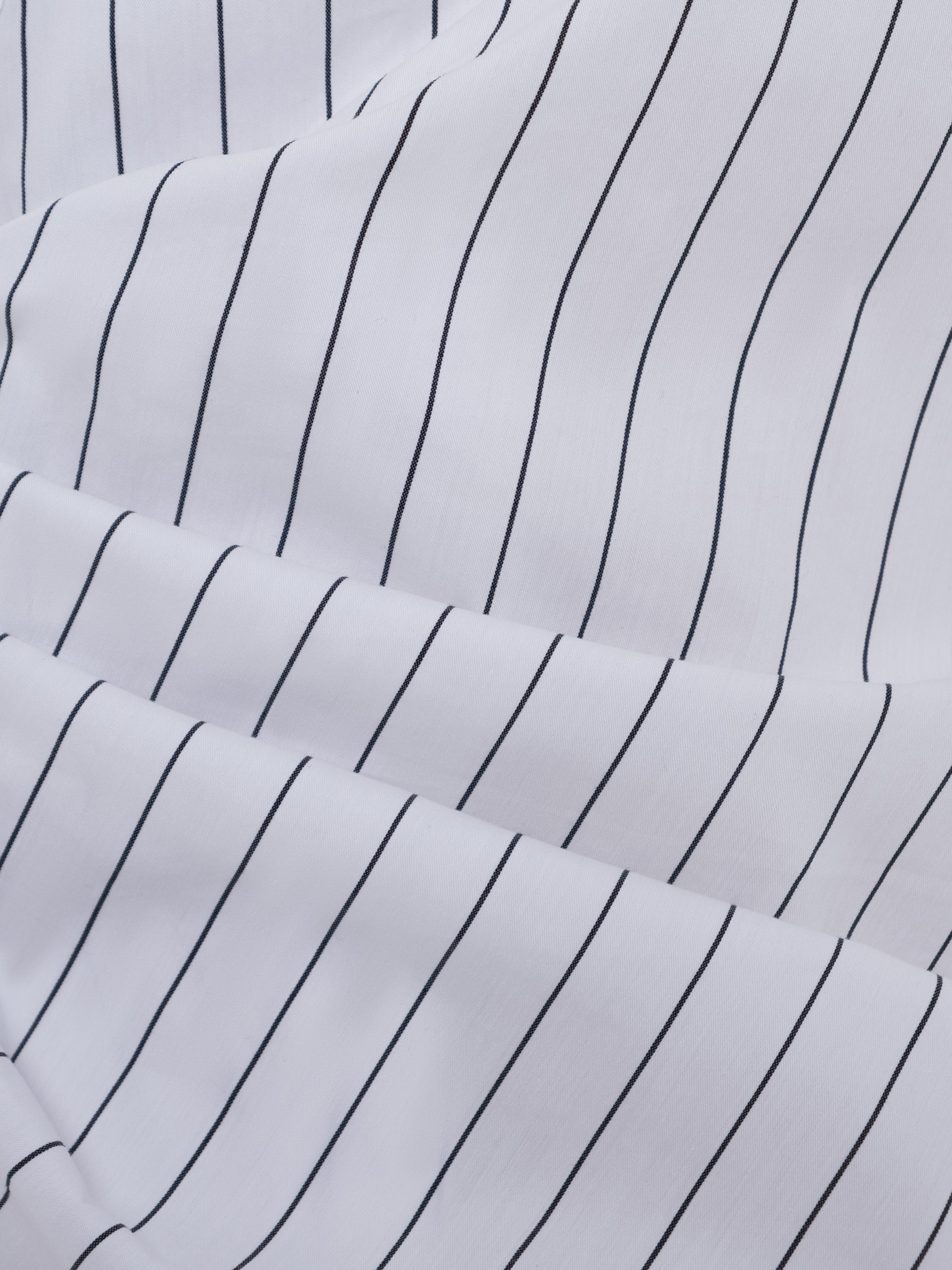 Fitted striped shirt with asymmetrical fastening