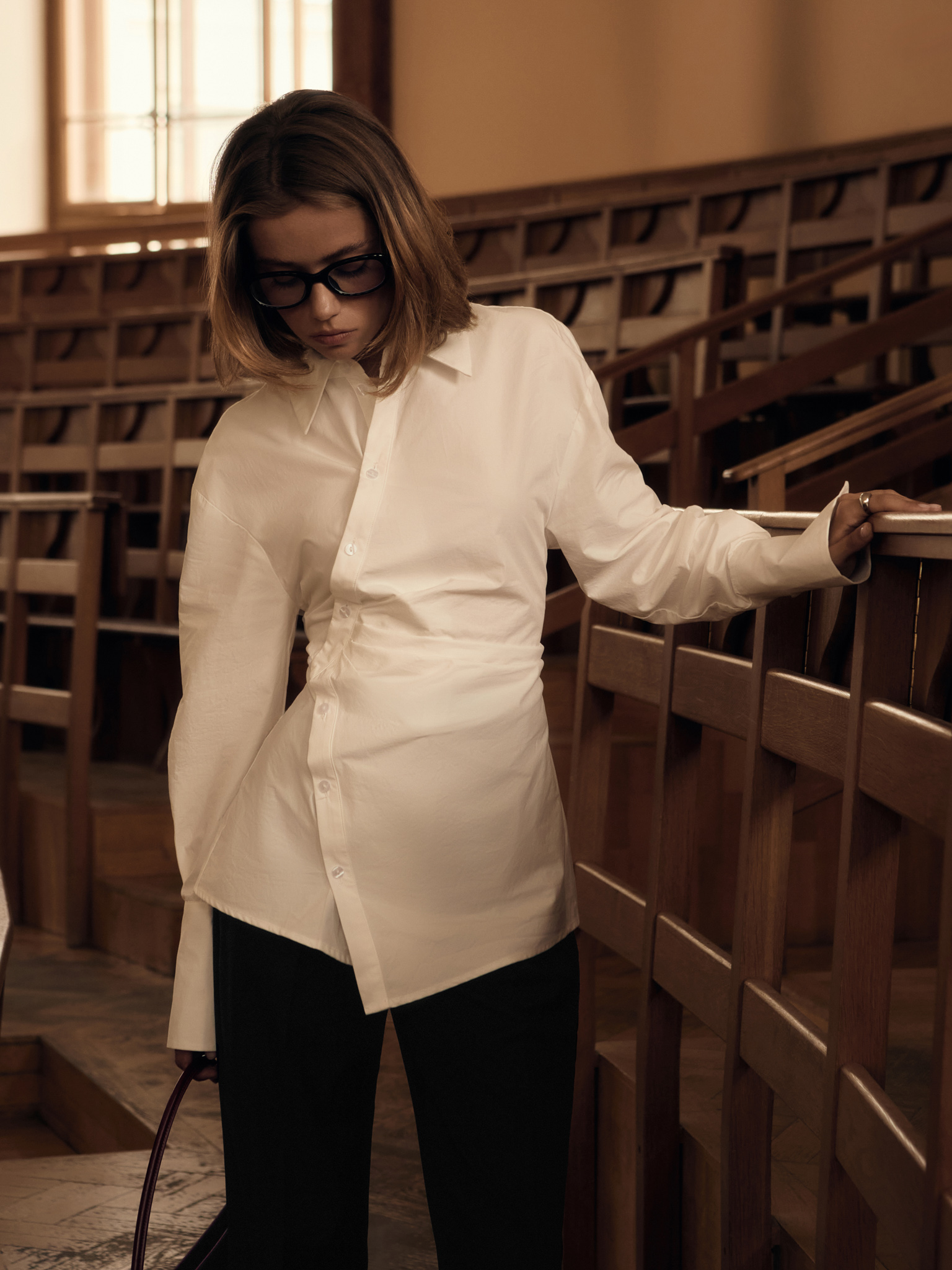 Fitted shirt with asymmetrical fastening