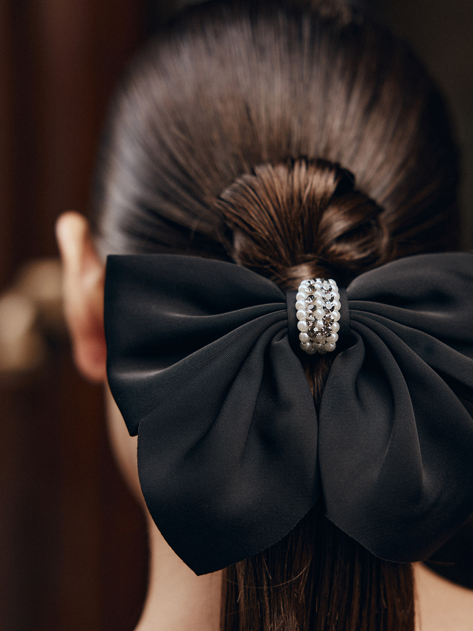 Hair bow with rhinestone and pearl decoration