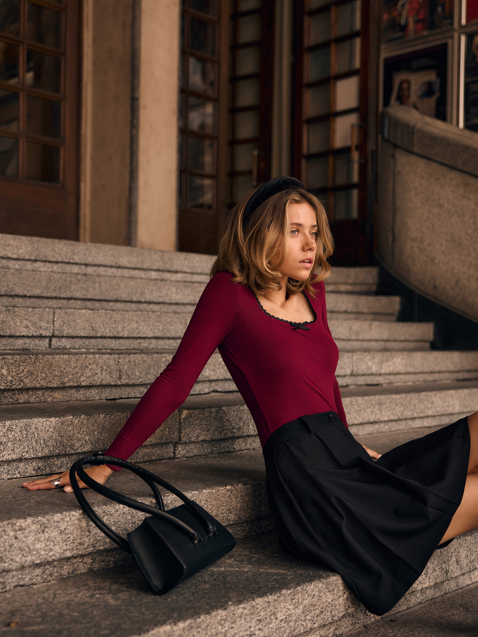 Jersey knitted longsleeve with openwork and bow on collar