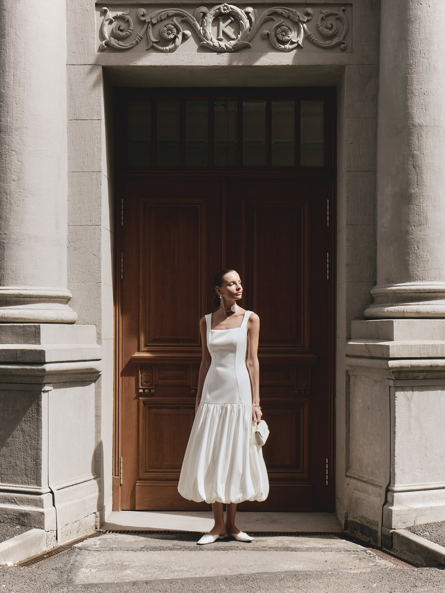 Fitted midi dress with flounce on the skirt