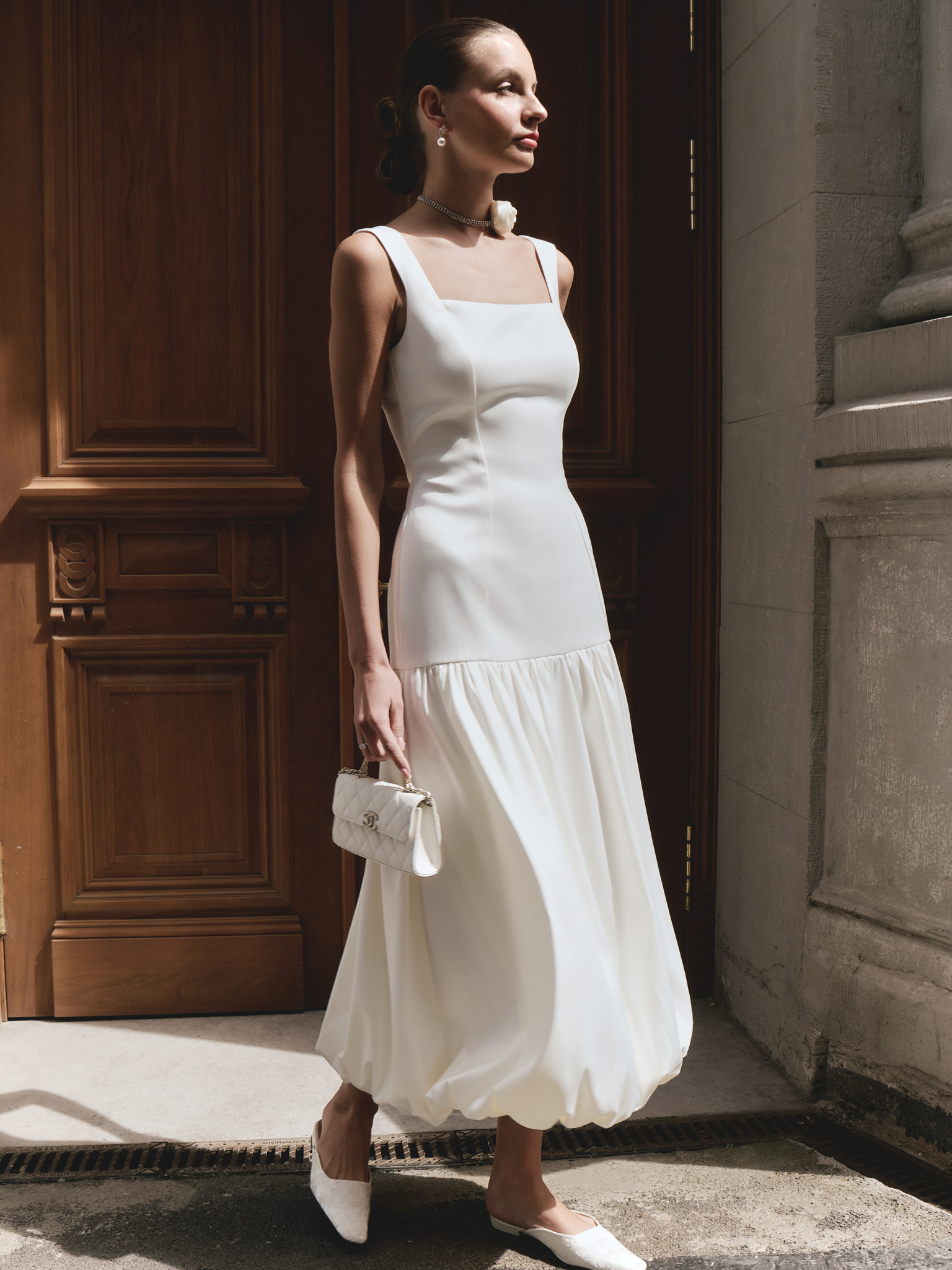 Fitted midi dress with flounce on the skirt