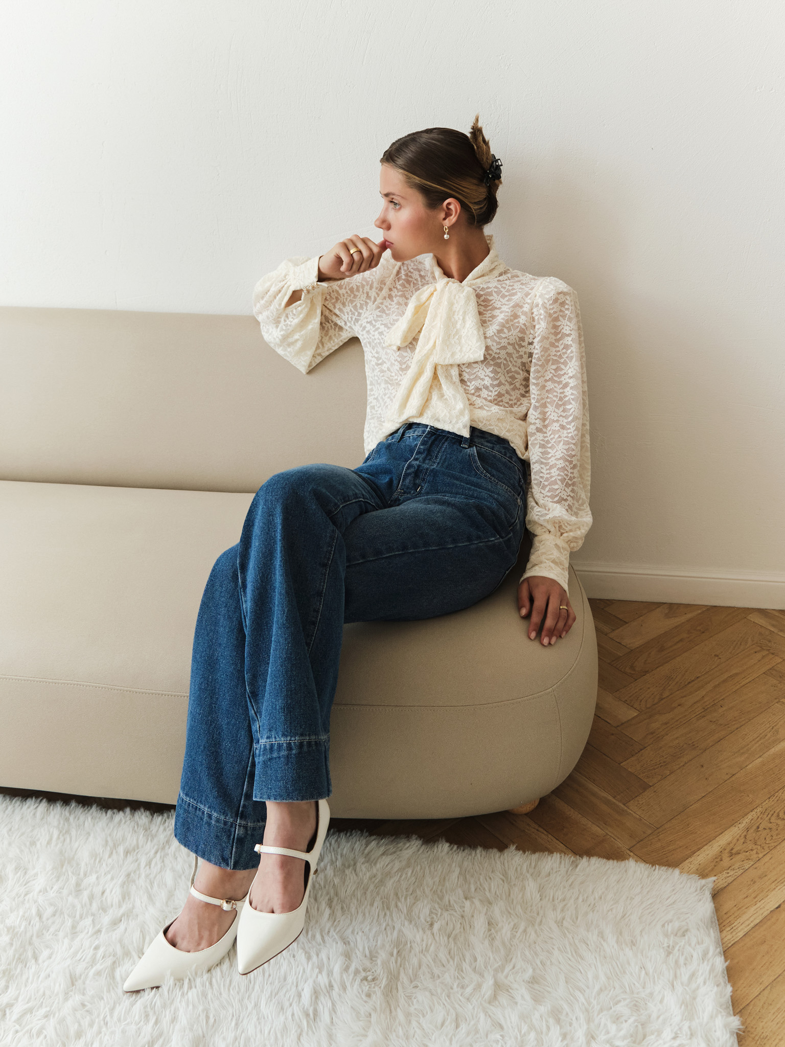 Lace blouse with a bow on the collar