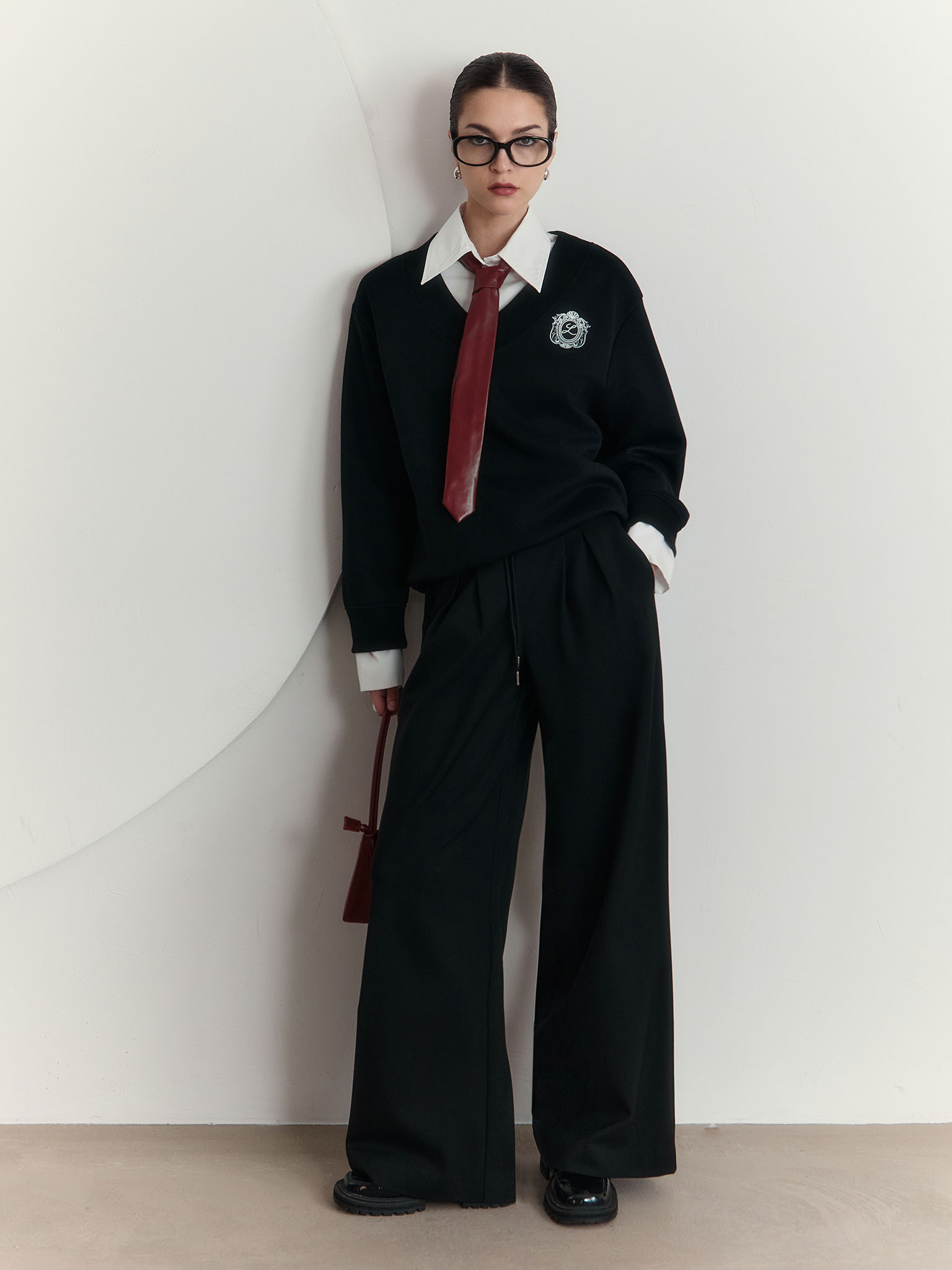 Palazzo trousers with pleats and matching ties