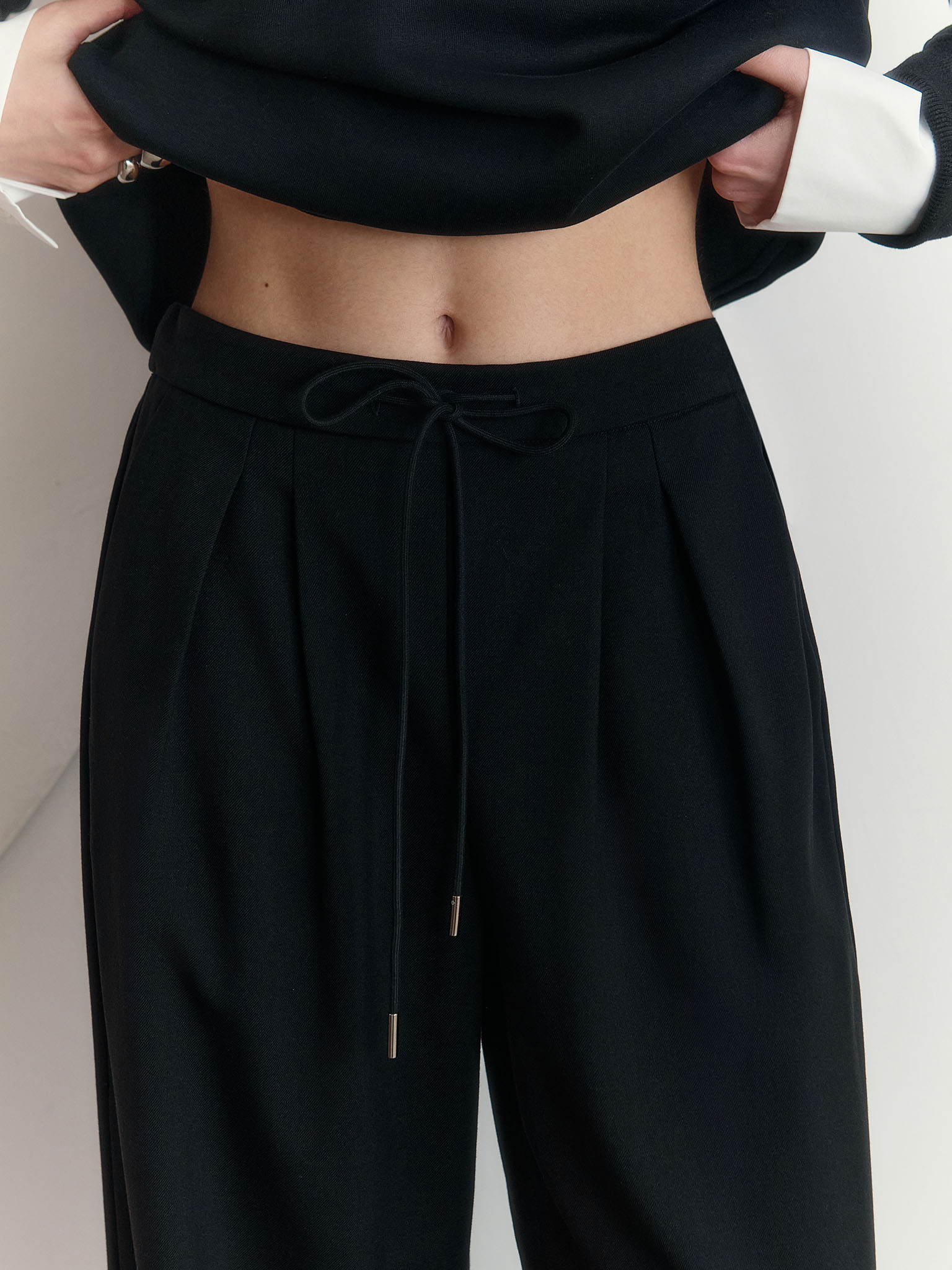 Palazzo trousers with pleats and matching ties