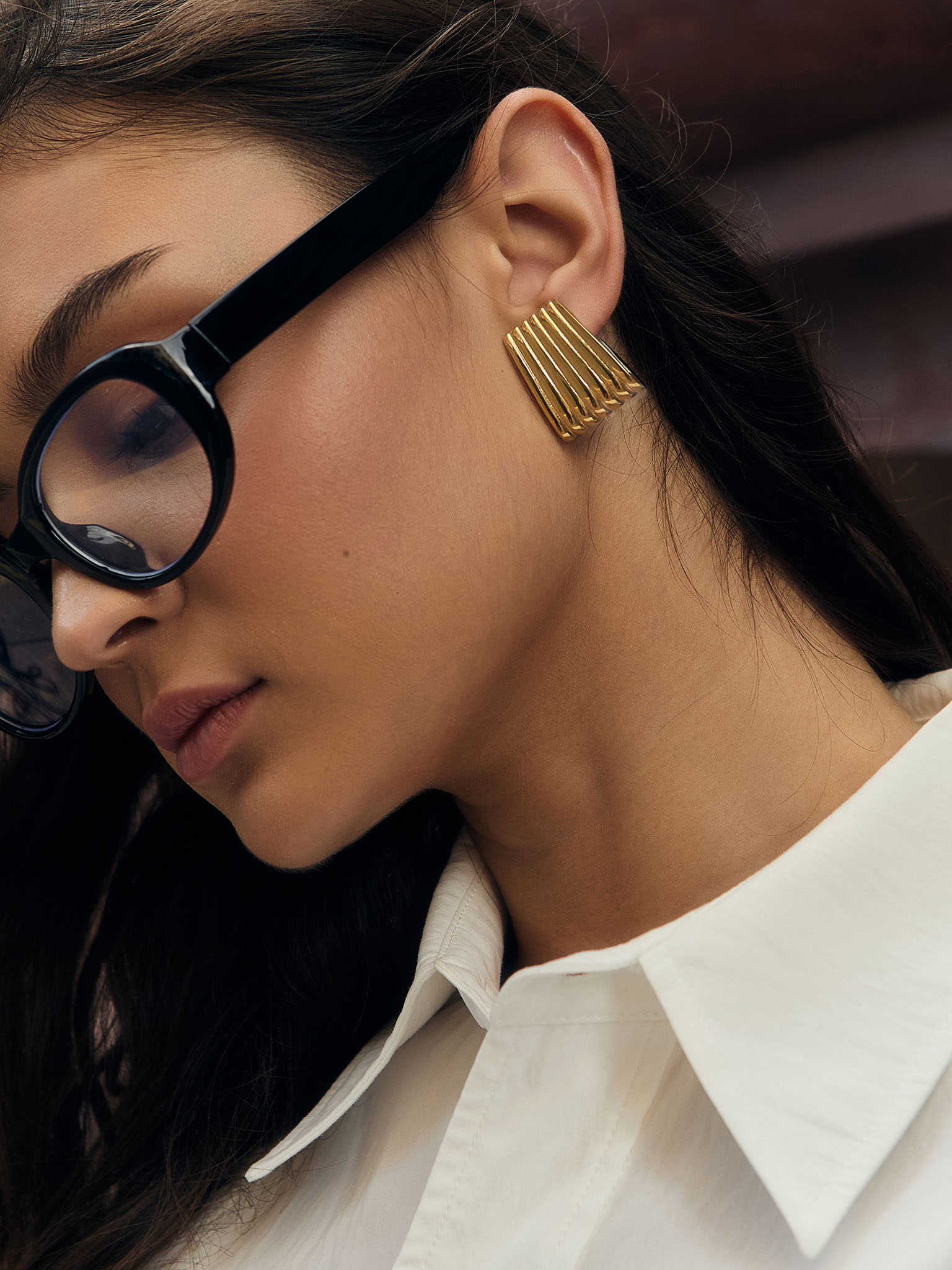 Trapezoidal stud earrings in textured metal