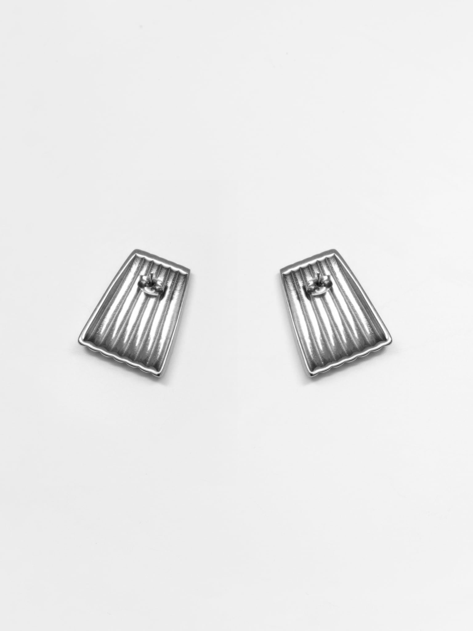 Trapezoidal stud earrings in textured metal