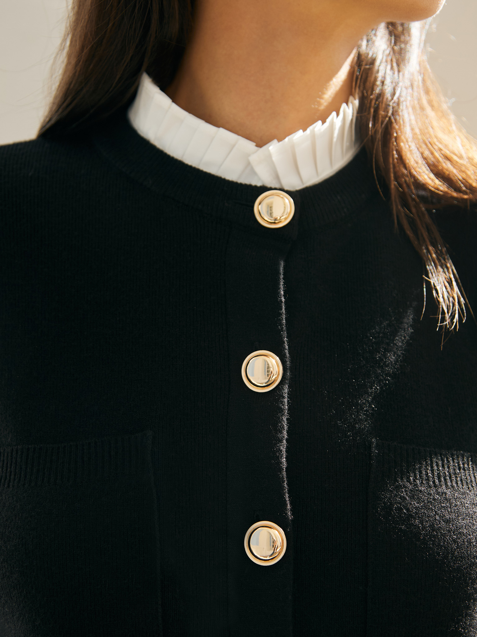 Cardigan with pleated insert on the collar