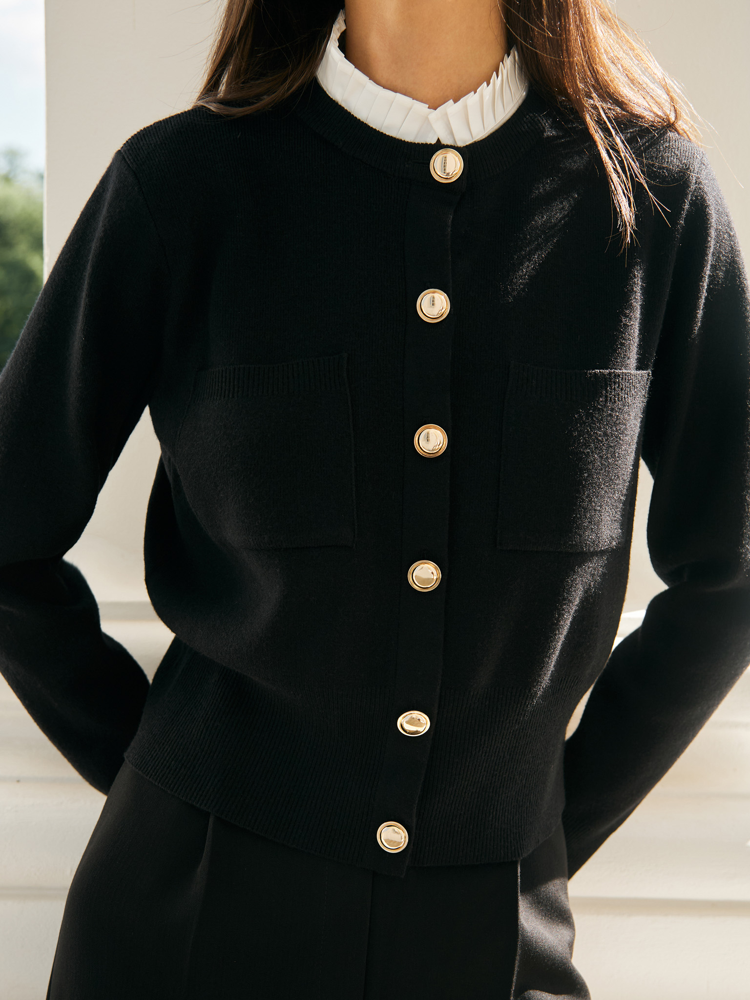 Cardigan with pleated insert on the collar
