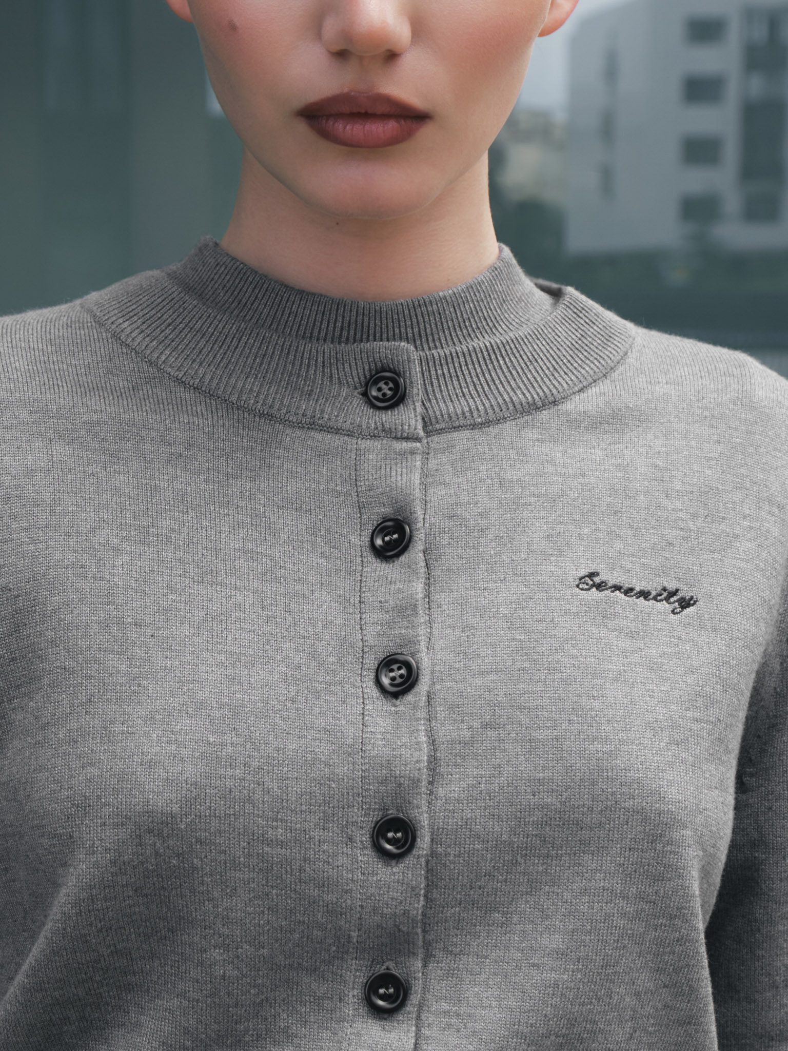 Knitted cardigan with chest embroidery