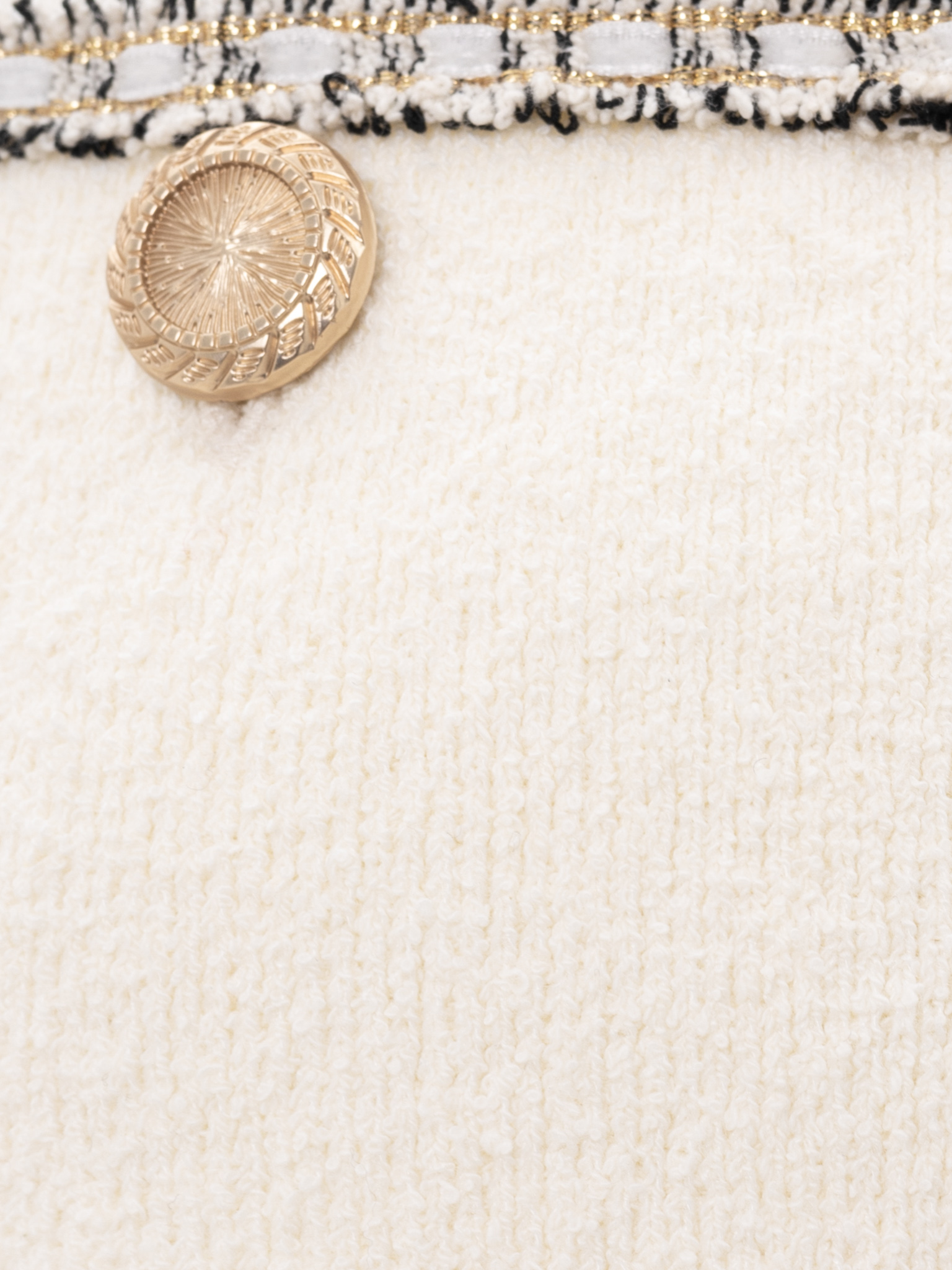 Knitted jersey top with textured details and buttons