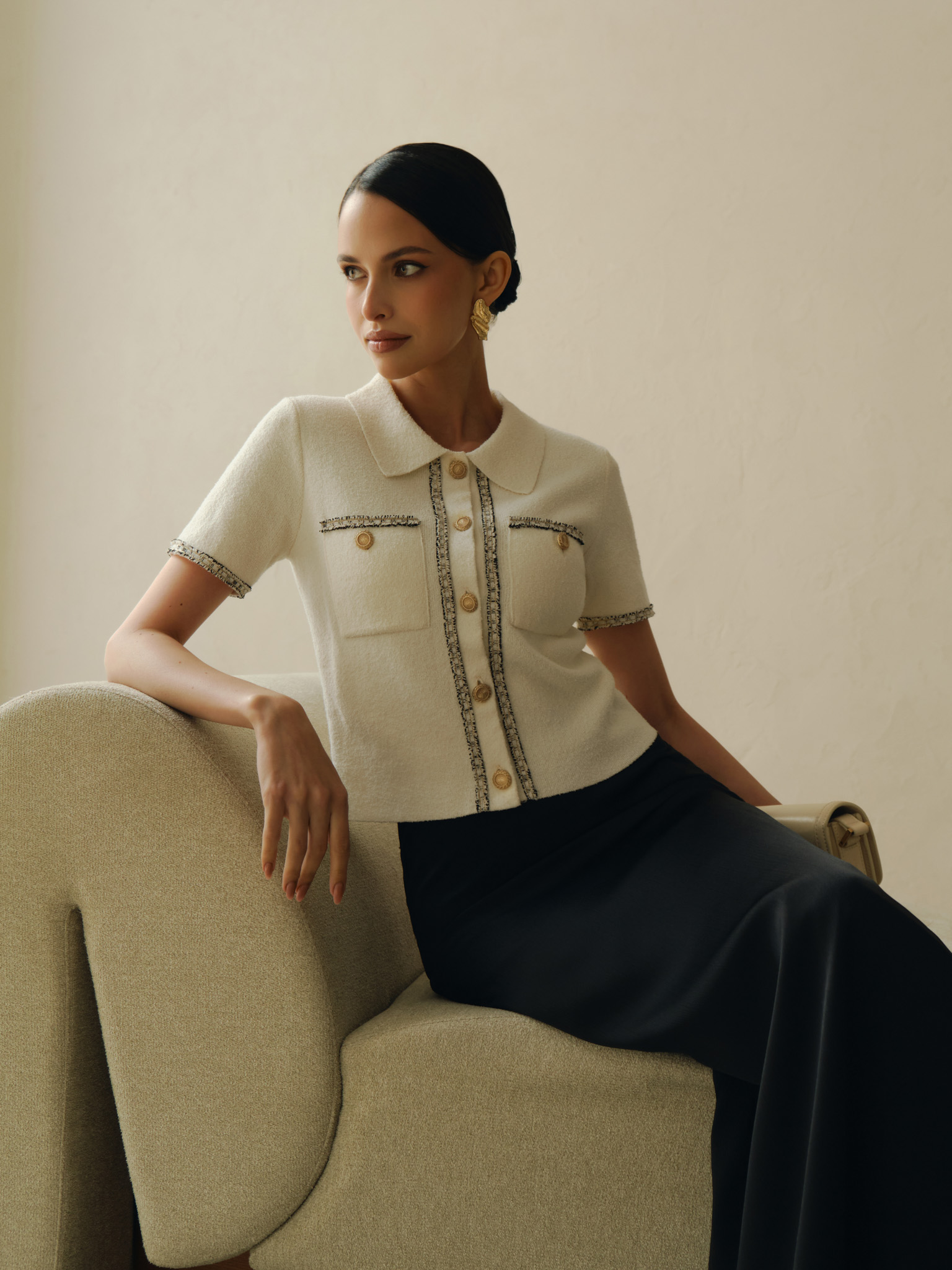 Knitted jersey top with textured details and buttons