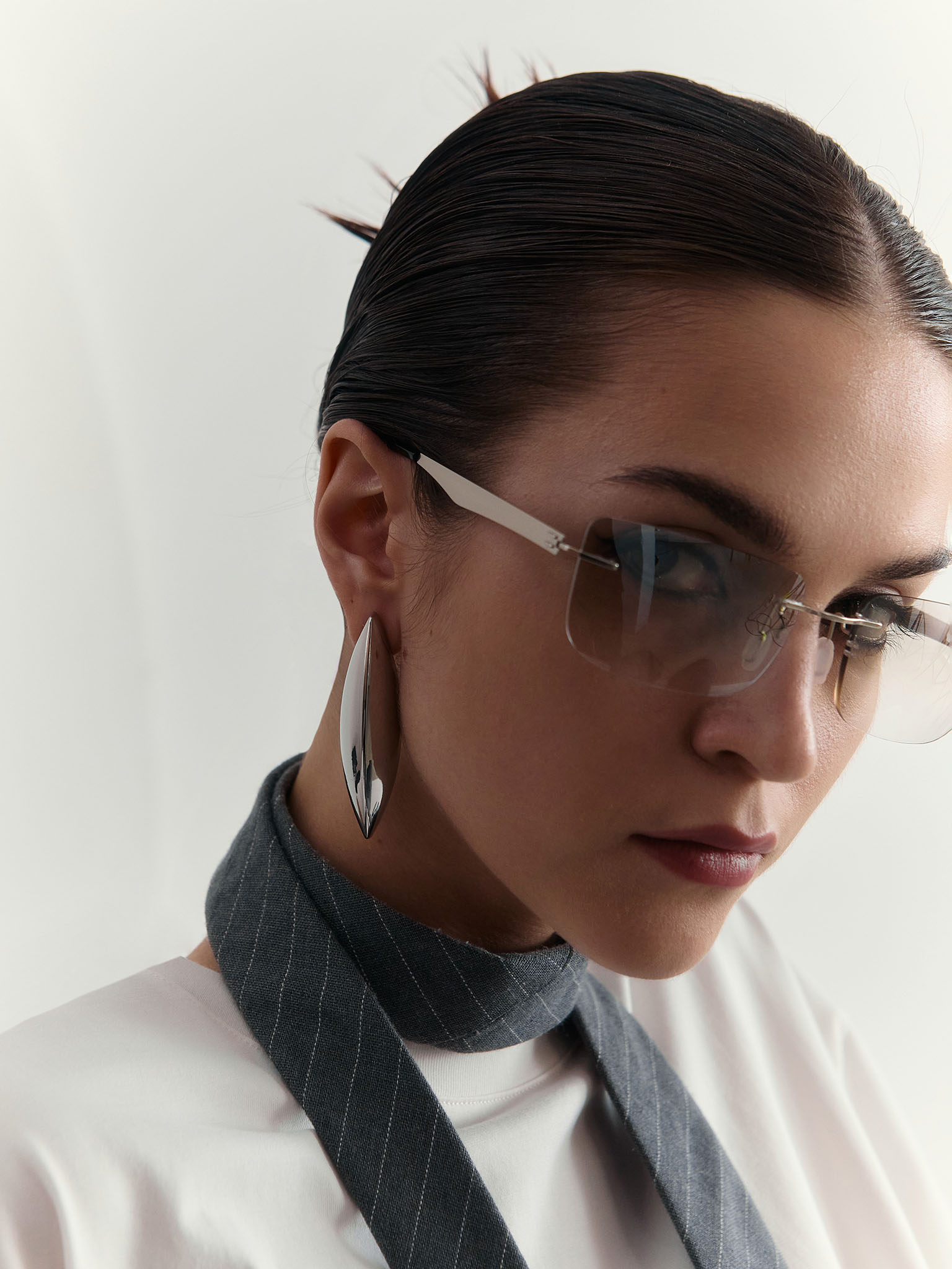 Elongated stud earrings