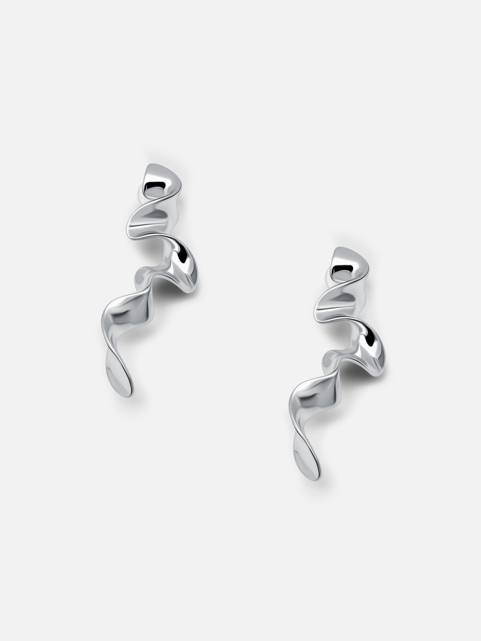 Curved metal stud earrings