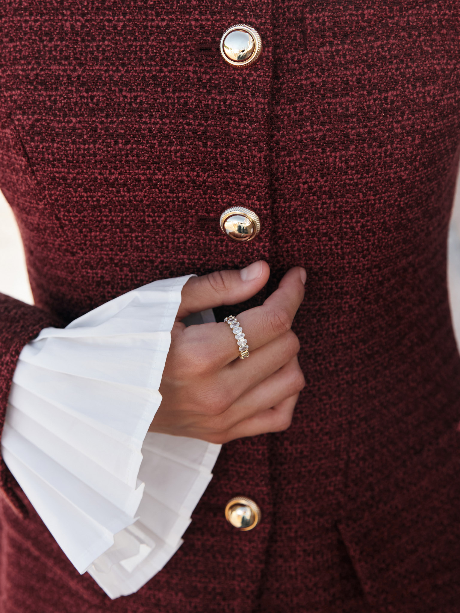 Veste longue en tweed avec boutons en métal