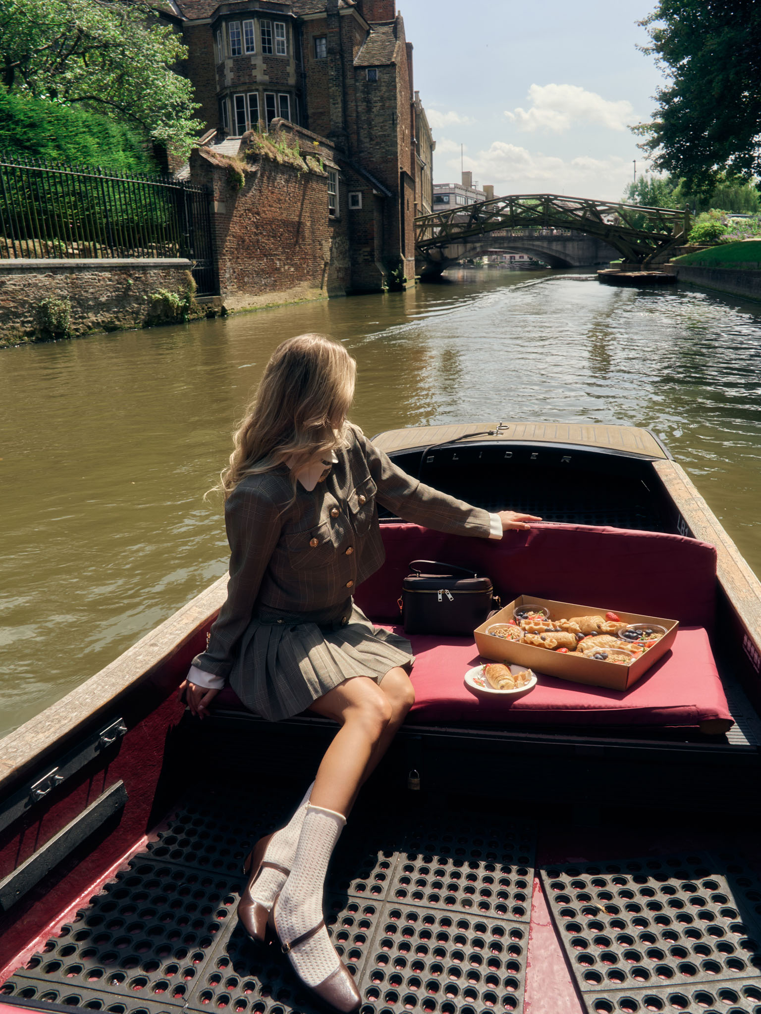 Mini checked skirt with large buttons on the pockets