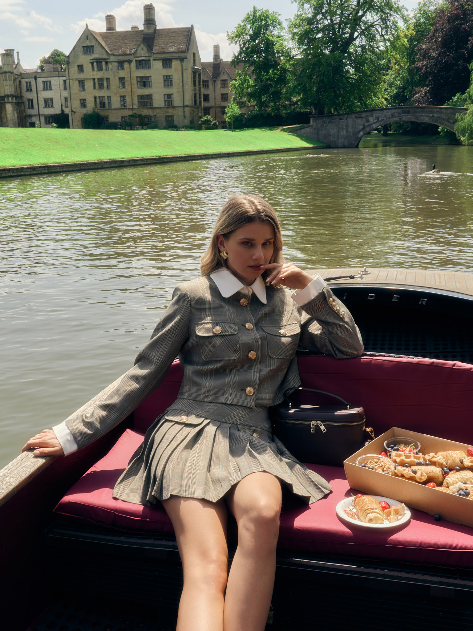 Mini checked skirt with large buttons on the pockets