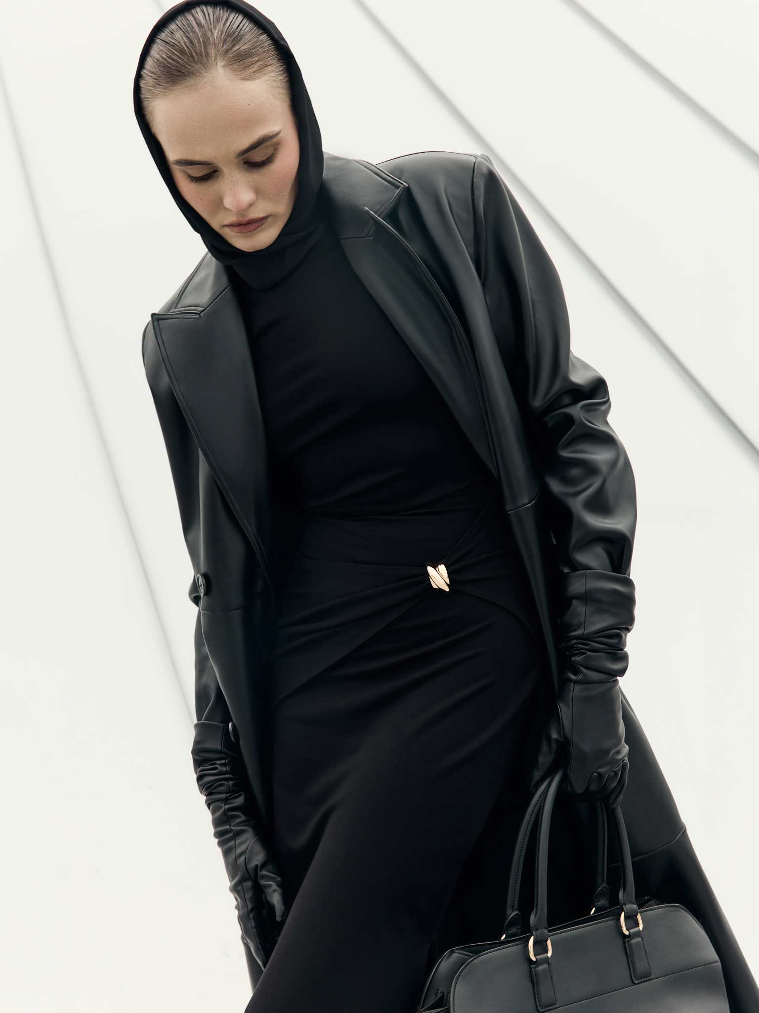 Eco-leather maxi trench with horizontal seams and tonal belt
