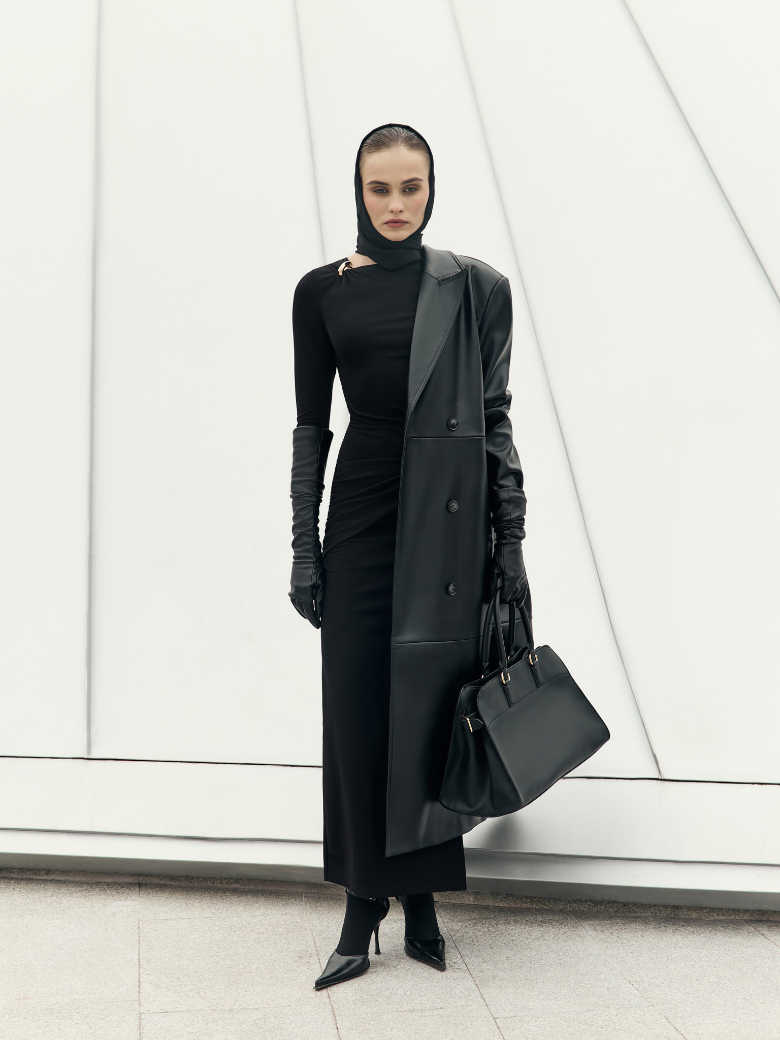 Eco-leather maxi trench with horizontal seams and tonal belt