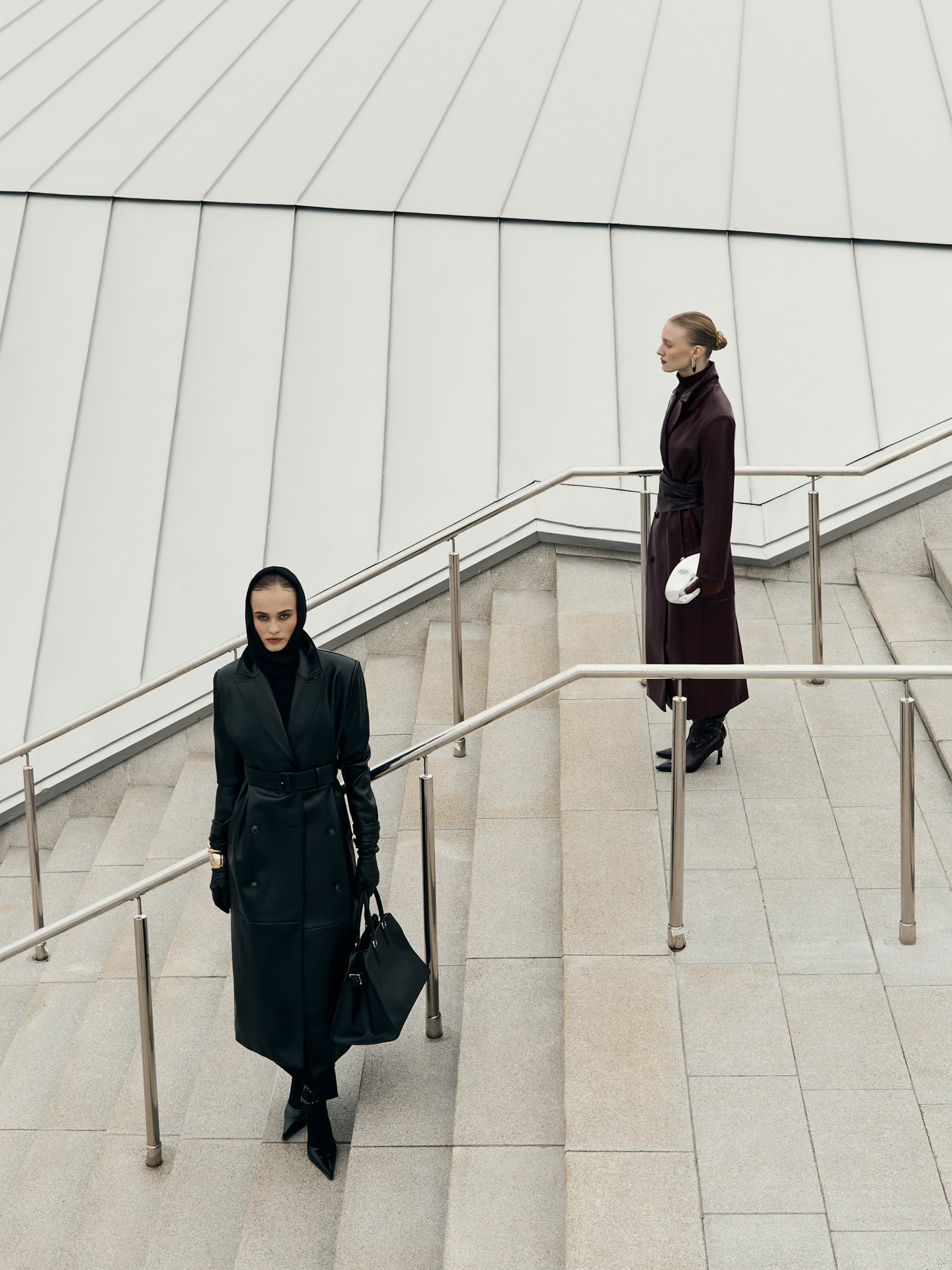 Eco-leather maxi trench with horizontal seams and tonal belt