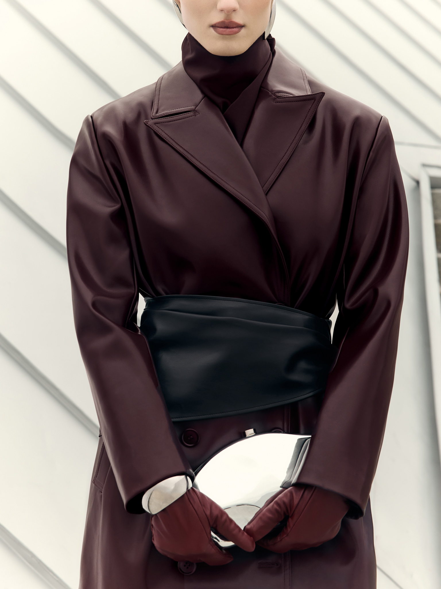 Eco-leather maxi trench with horizontal seams and tonal belt