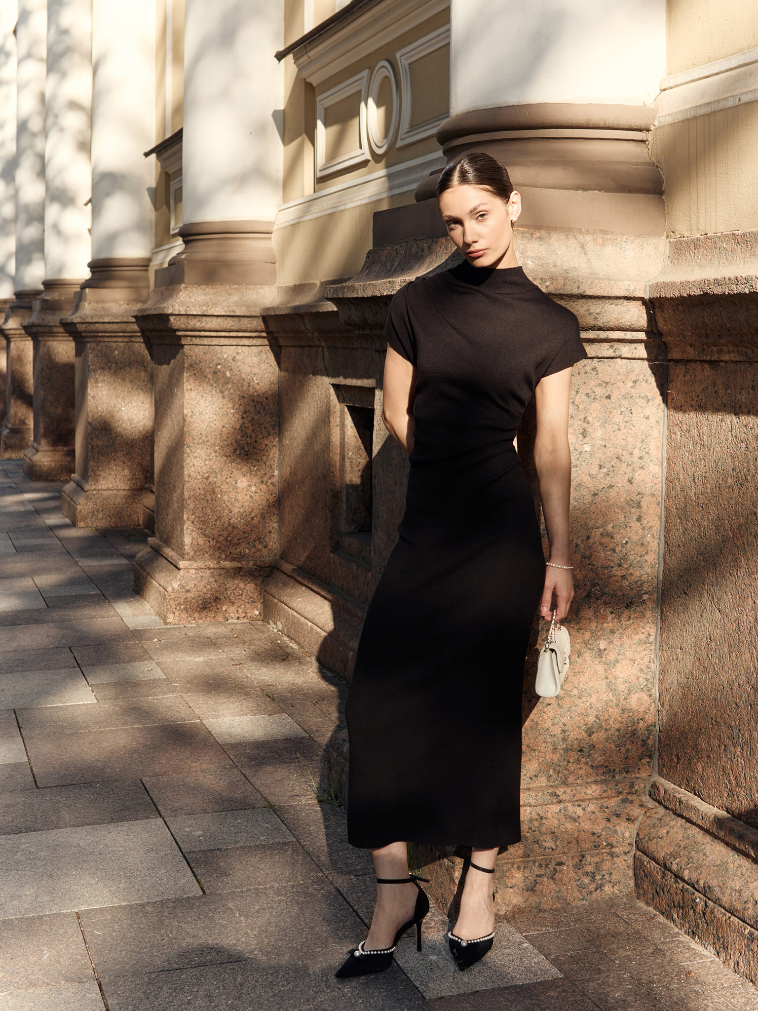 Knitted midi dress with stand-up collar and asymmetric gathers